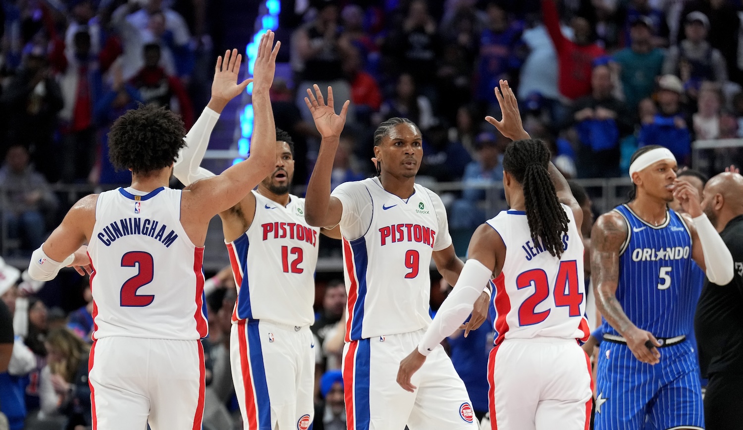 DETROIT, MICHIGAN - MAY 03: Daniss Jenkins #24, Cade Cunningham #2, Tobias Harris #12 and Ausar Thompson #9 of the Detroit Pistons celebrate a basket against Paolo Banchero #5 of the Orlando Magic during the second quarter in Game Seven of the First Round of the NBA Eastern Conference Playoffs at Little Caesars Arena on May 03, 2026 in Detroit, Michigan. NOTE TO USER: User expressly acknowledges and agrees that, by downloading and or using this photograph, User is consenting to the terms and conditions of the Getty Images License Agreement. (Photo by Nic Antaya/Getty Images)
