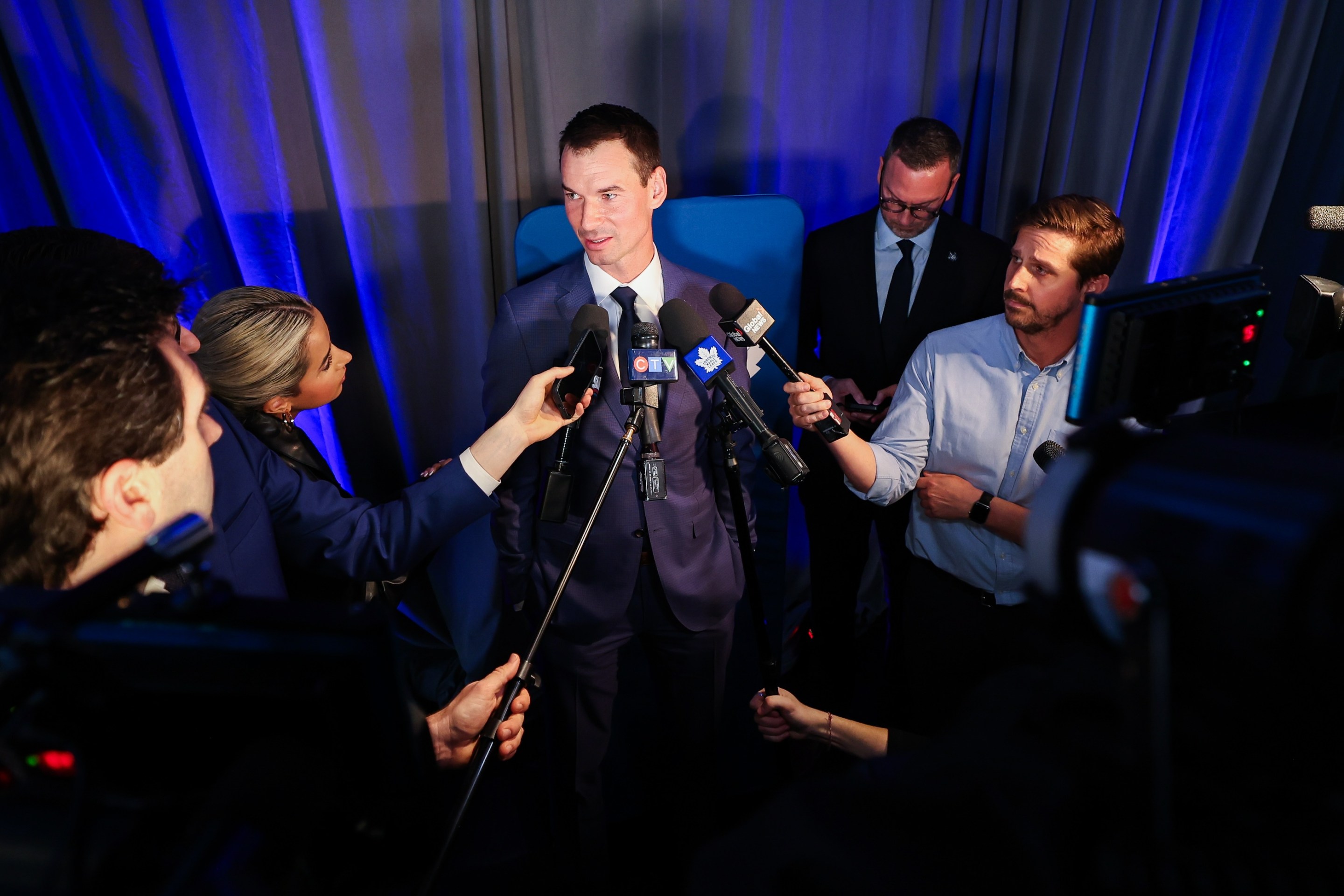 John Chayka speaks to media at a press conference he was announced as General Manager and Mats Sundin is introduced as Senior Executive Advisor of Hockey Operations of the Toronto Maple Leafs .