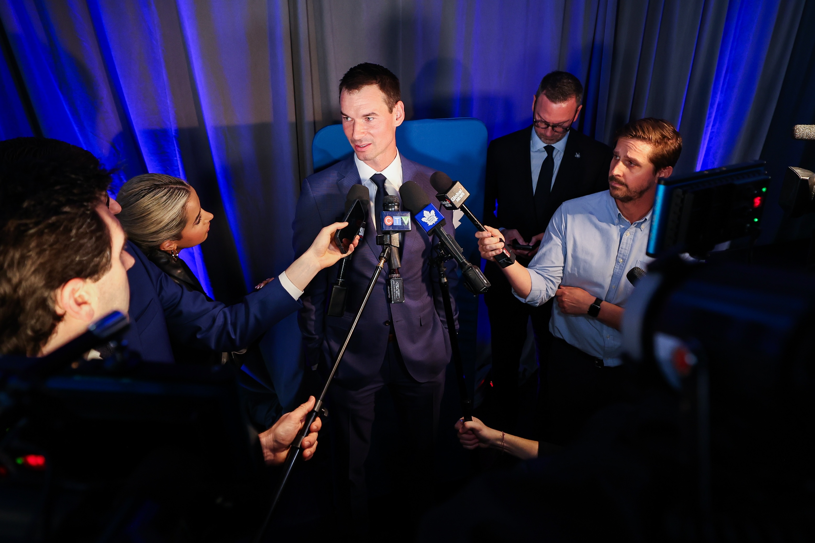 John Chayka speaks to media at a press conference he was announced as General Manager and Mats Sundin is introduced as Senior Executive Advisor of Hockey Operations of the Toronto Maple Leafs .