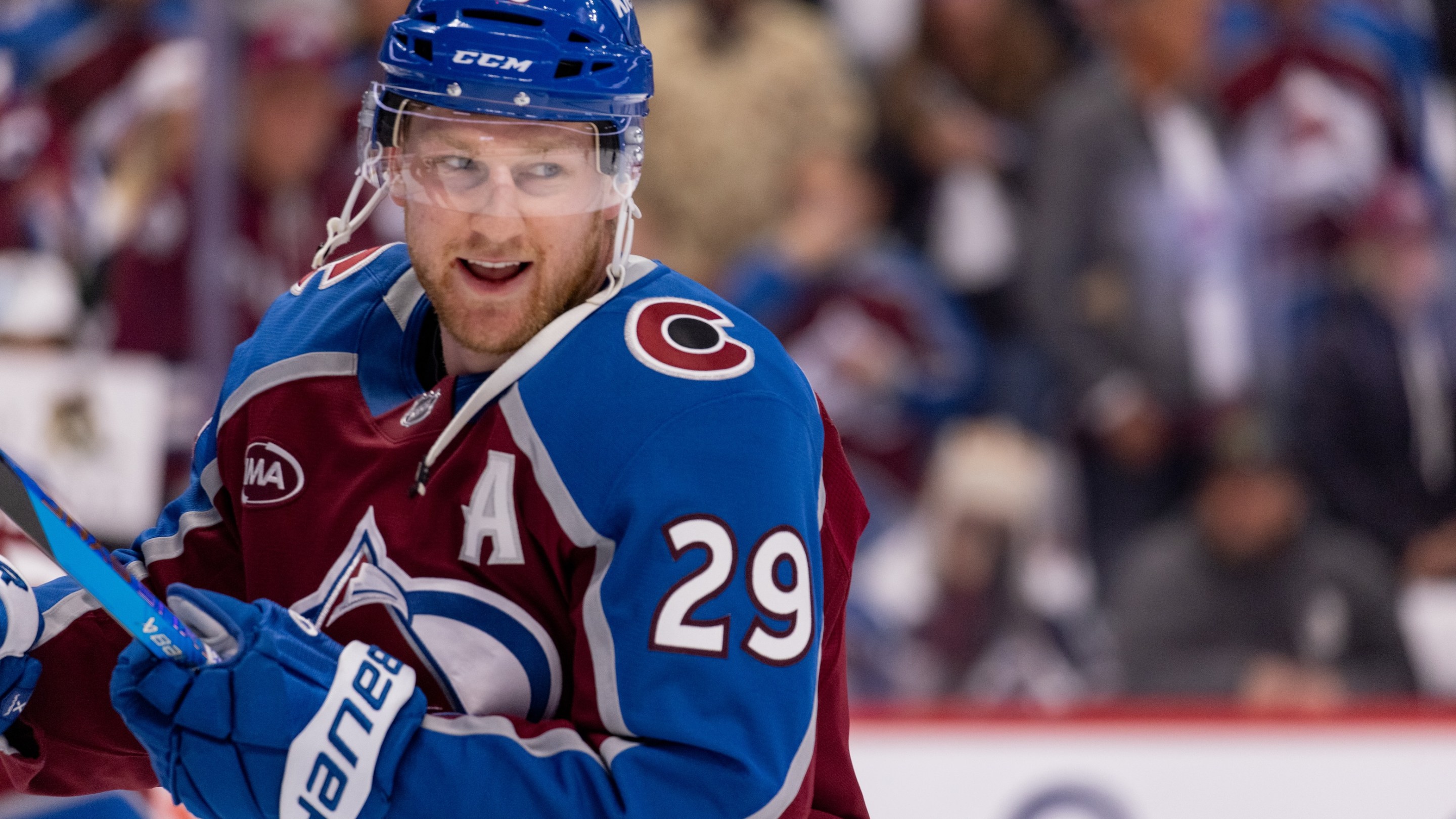 Nathan MacKinnon of the Colorado Avalanche smiles during warmups ahead of Round Two Game Two of the Stanley Cup Playoffs against the Minnesota Wild.