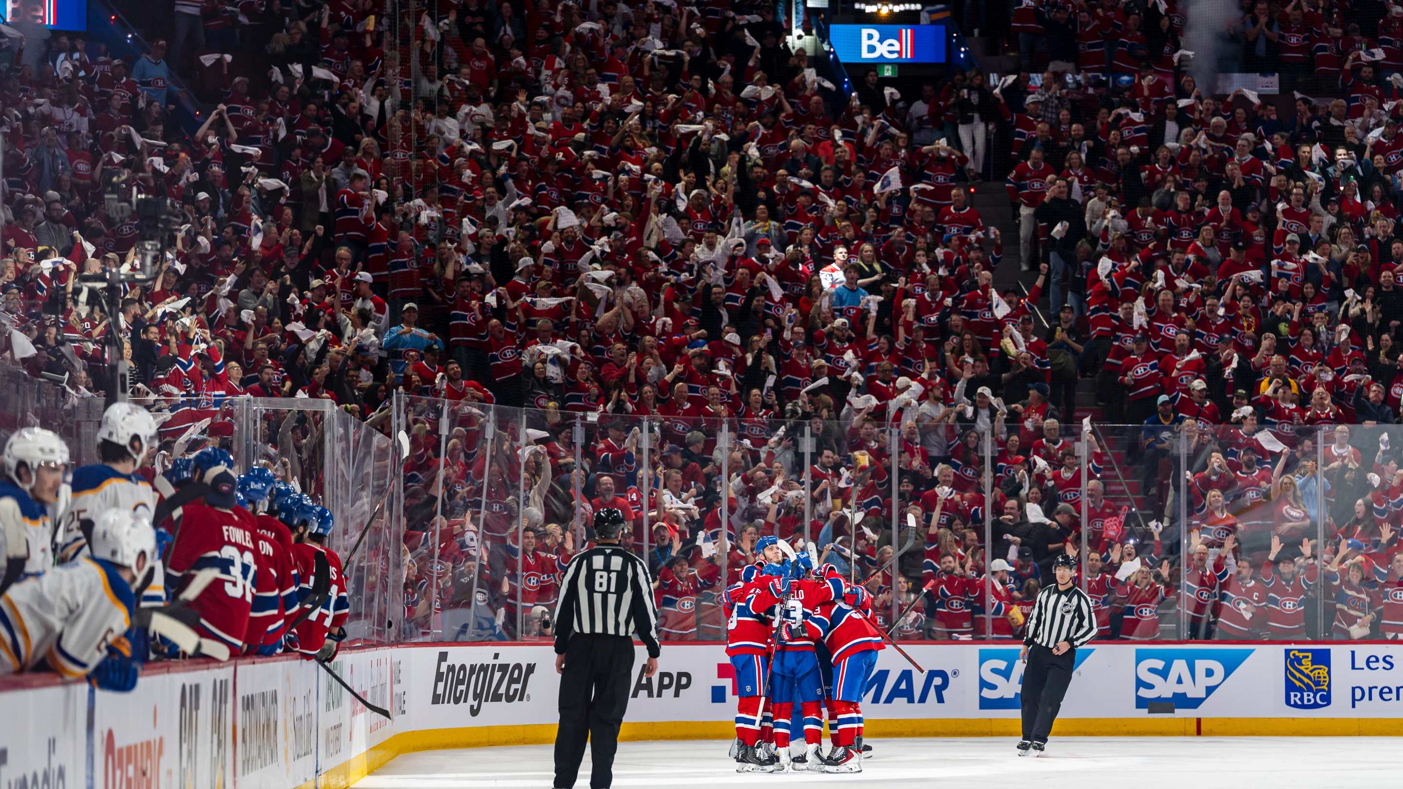 Cole Caufield #13 of the Montreal Canadiens celebrates after scoring a goal
