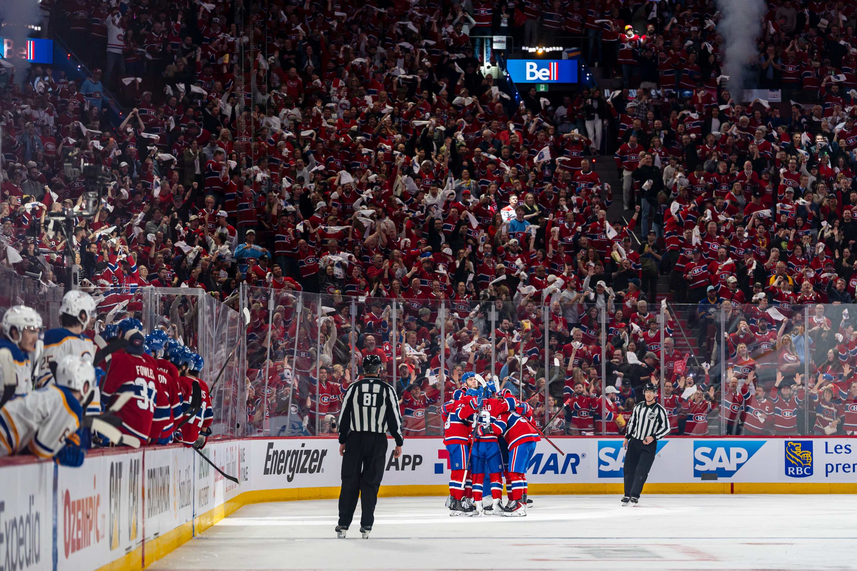 Cole Caufield #13 of the Montreal Canadiens celebrates after scoring a goal