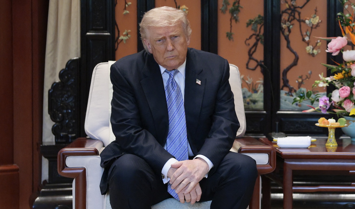 US President Donald Trump (L) meets with China’s President Xi Jinping on the sidelines of their visit to Zhongnanhai Garden in Beijing on May 15, 2026. (Photo by Evan Vucci / POOL / AFP)