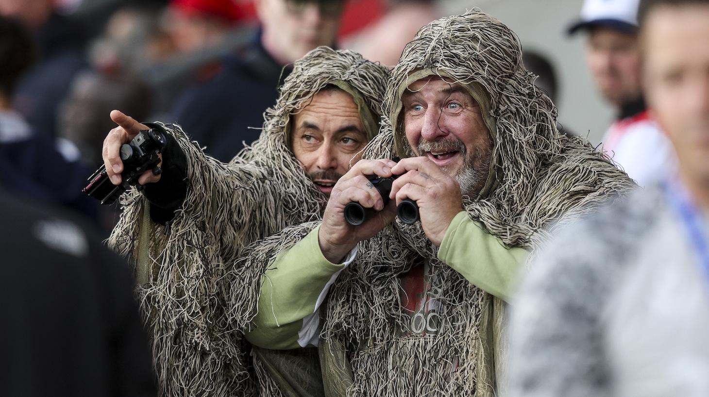Mocking Southampton fans in camouflage ghillie suits after their side was accused of spying on a Middlesbrough training session before the Sky Bet Championship Play Off Semi Final Second Leg match between Southampton and Middlesbrough at St Mary's Stadium on May 12, 2026 in Southampton, England.