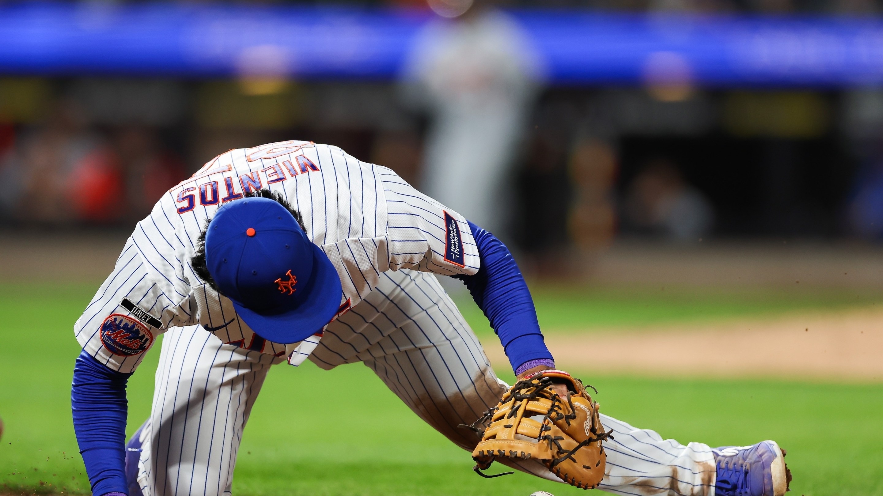 Mark Vientos of the New York Mets attempts to force out Zach McKinstry #39 of the Detroit Tigers after a fielding error during the sixth inning at Citi Field on May 13, 2026.