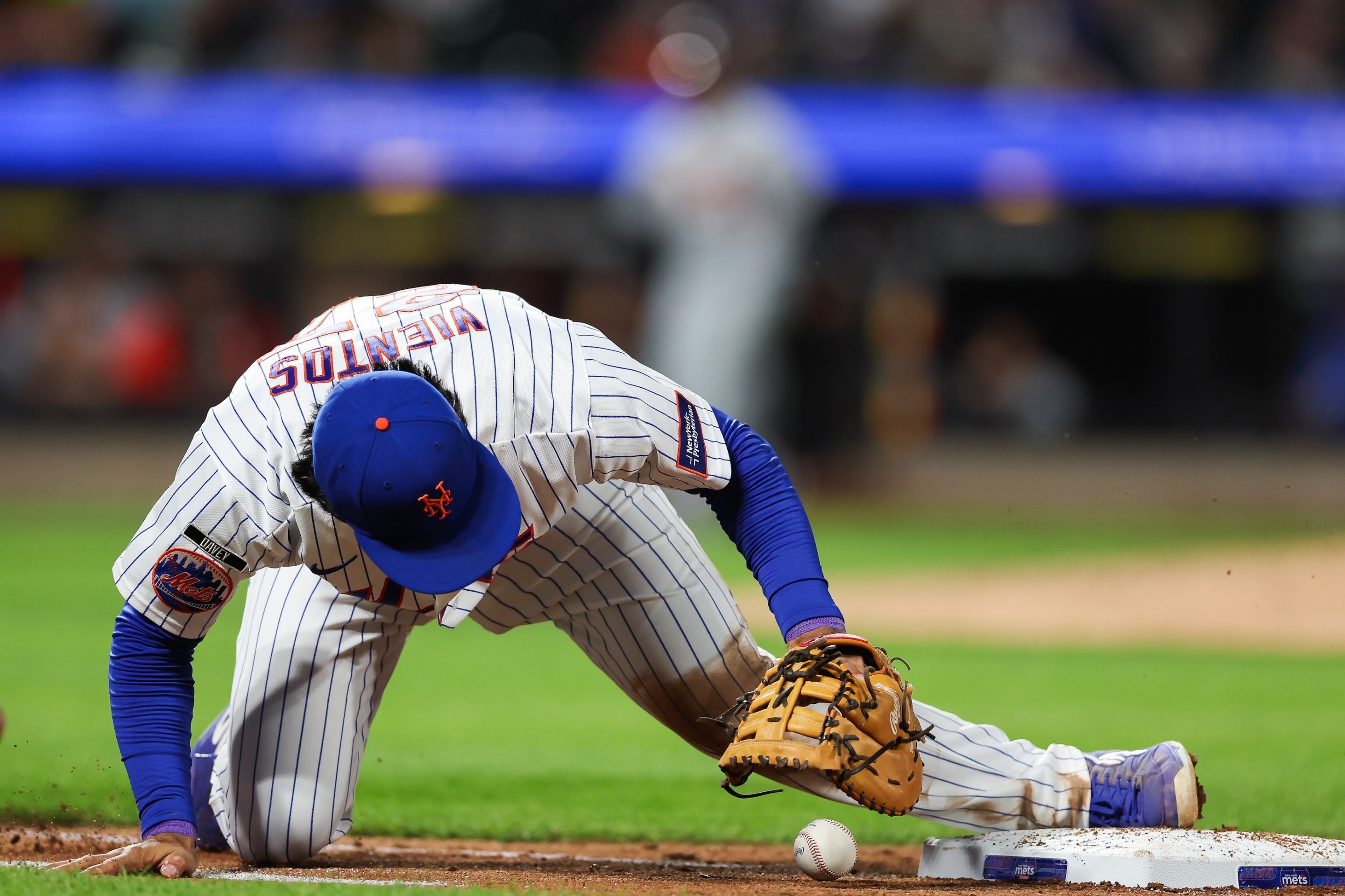 Mark Vientos of the New York Mets attempts to force out Zach McKinstry #39 of the Detroit Tigers after a fielding error during the sixth inning at Citi Field on May 13, 2026.