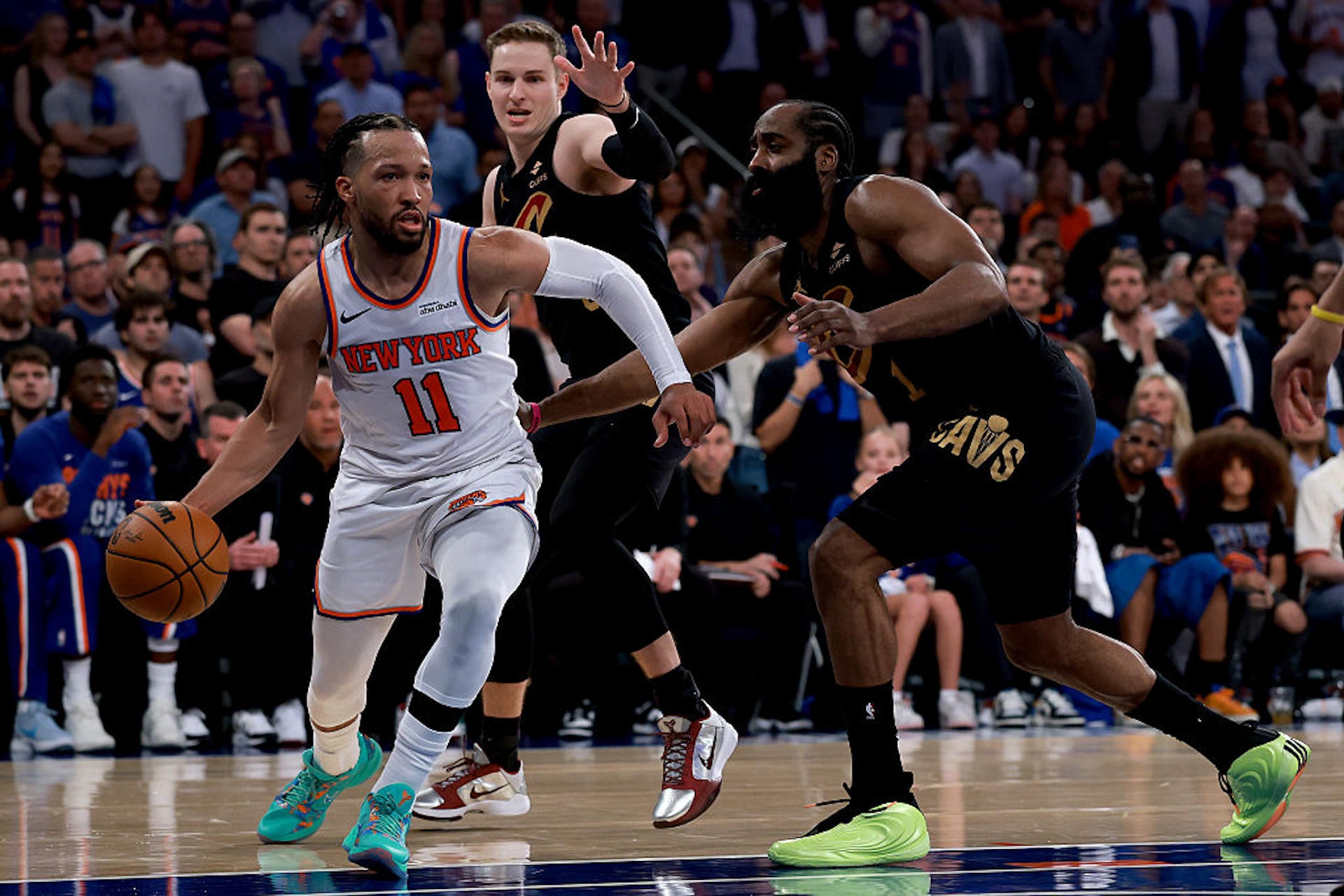 Jalen Brunson dribbles past James Harden