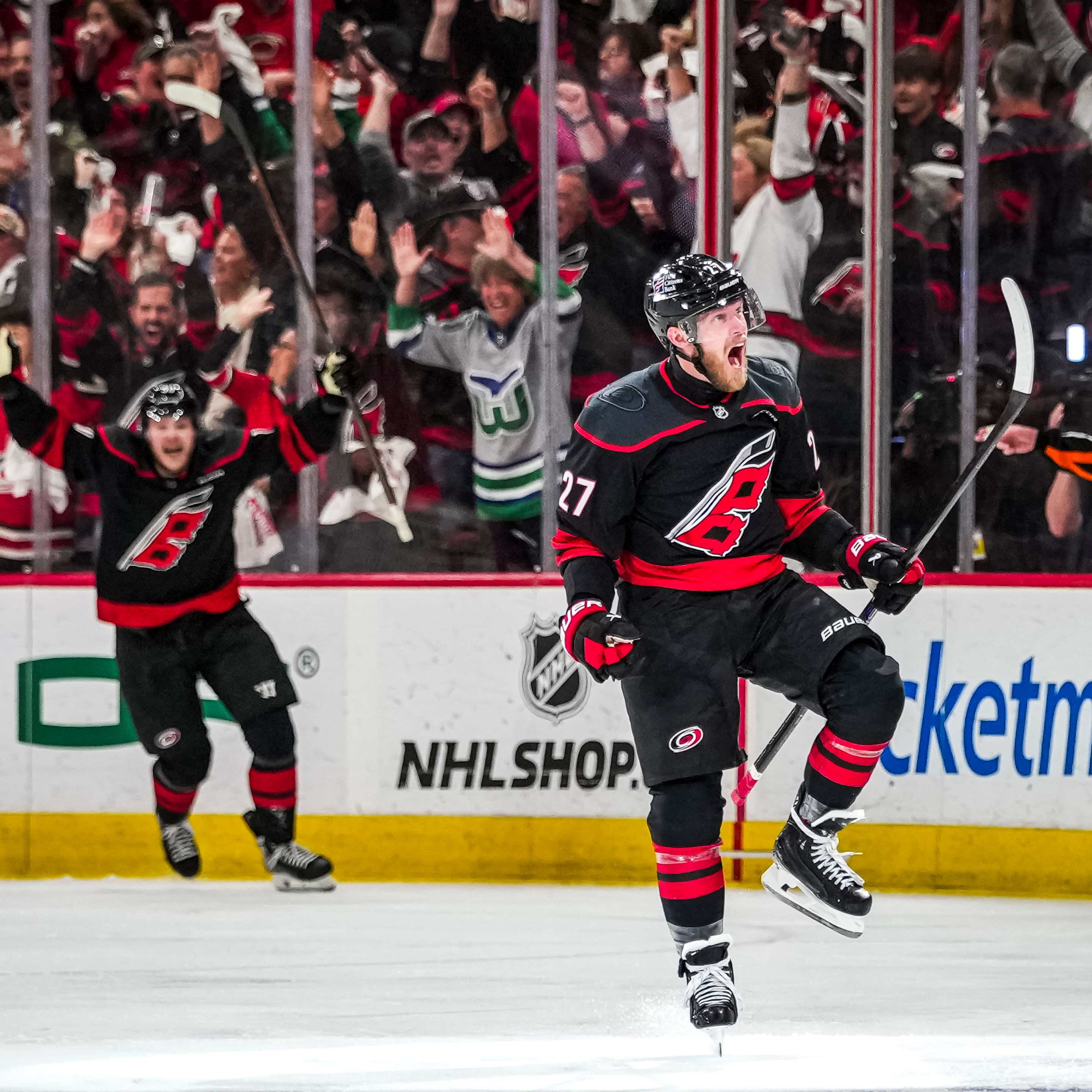 Nikolaj Ehlers #27 of the Carolina Hurricanes celebrates the overtime winning goal in Game Two of the Eastern Conference Final of the 2026 Stanley Cup Playoffs