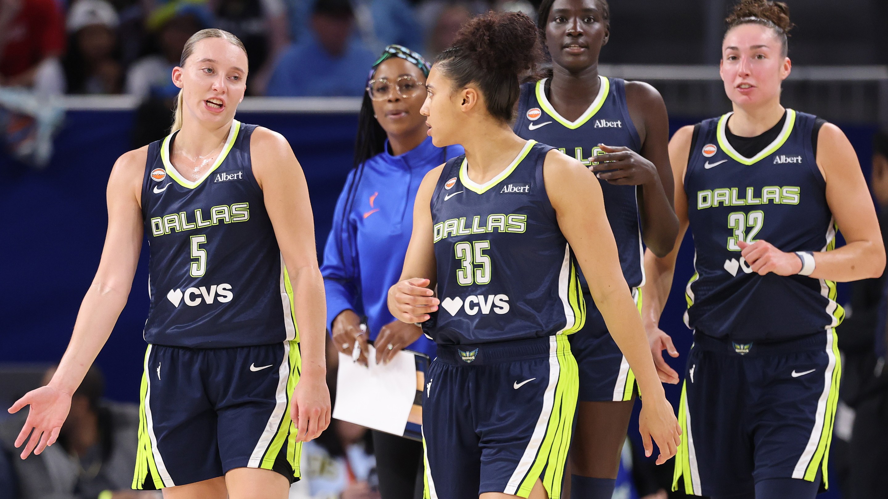 Paige Bueckers #5 and Azzi Fudd #35 of the Dallas Wings confer against the Chicago Sky during the first half at Wintrust Arena on May 20, 2026 in Chicago, Illinois.