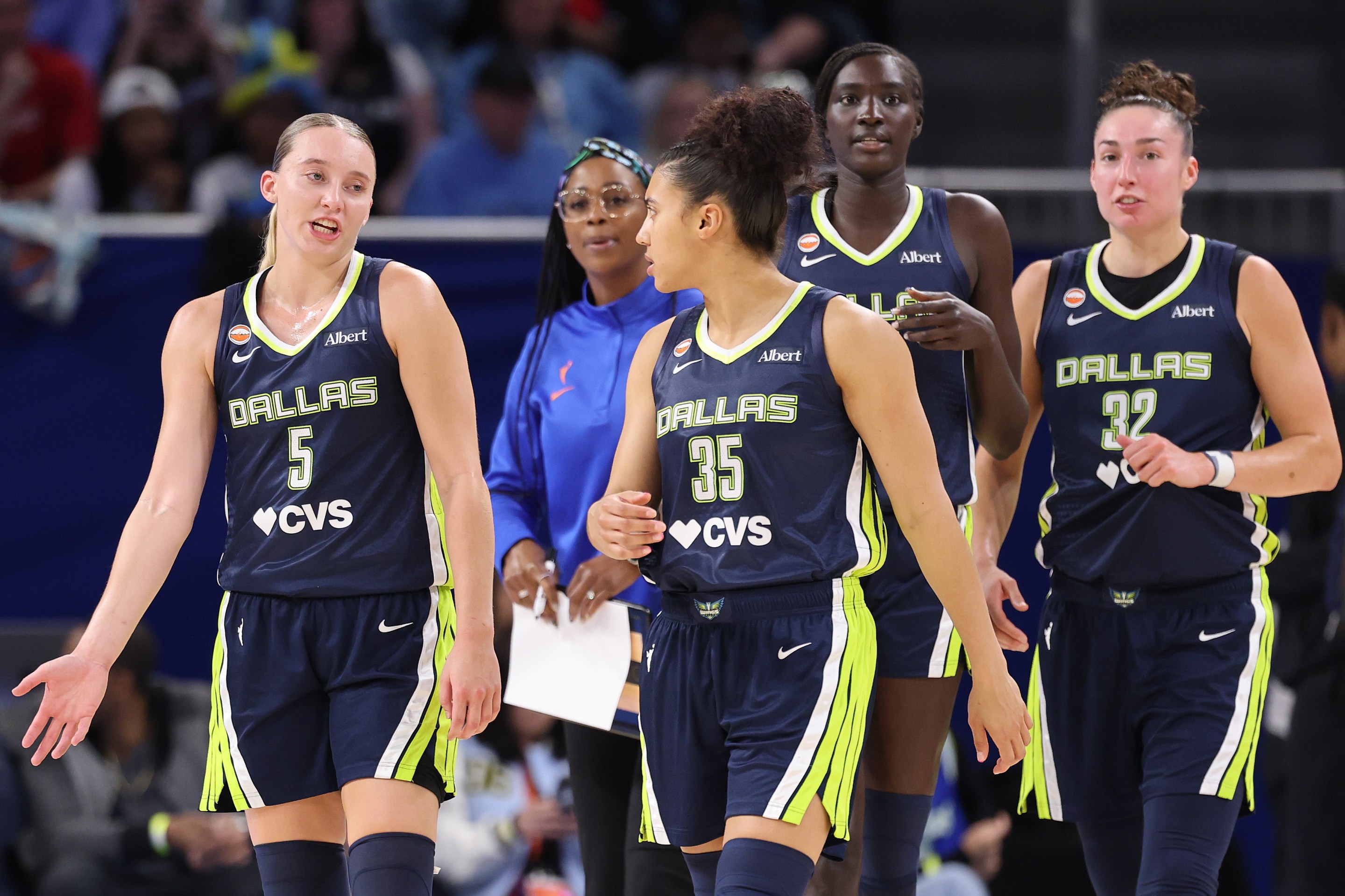 Paige Bueckers #5 and Azzi Fudd #35 of the Dallas Wings confer against the Chicago Sky during the first half at Wintrust Arena on May 20, 2026 in Chicago, Illinois.