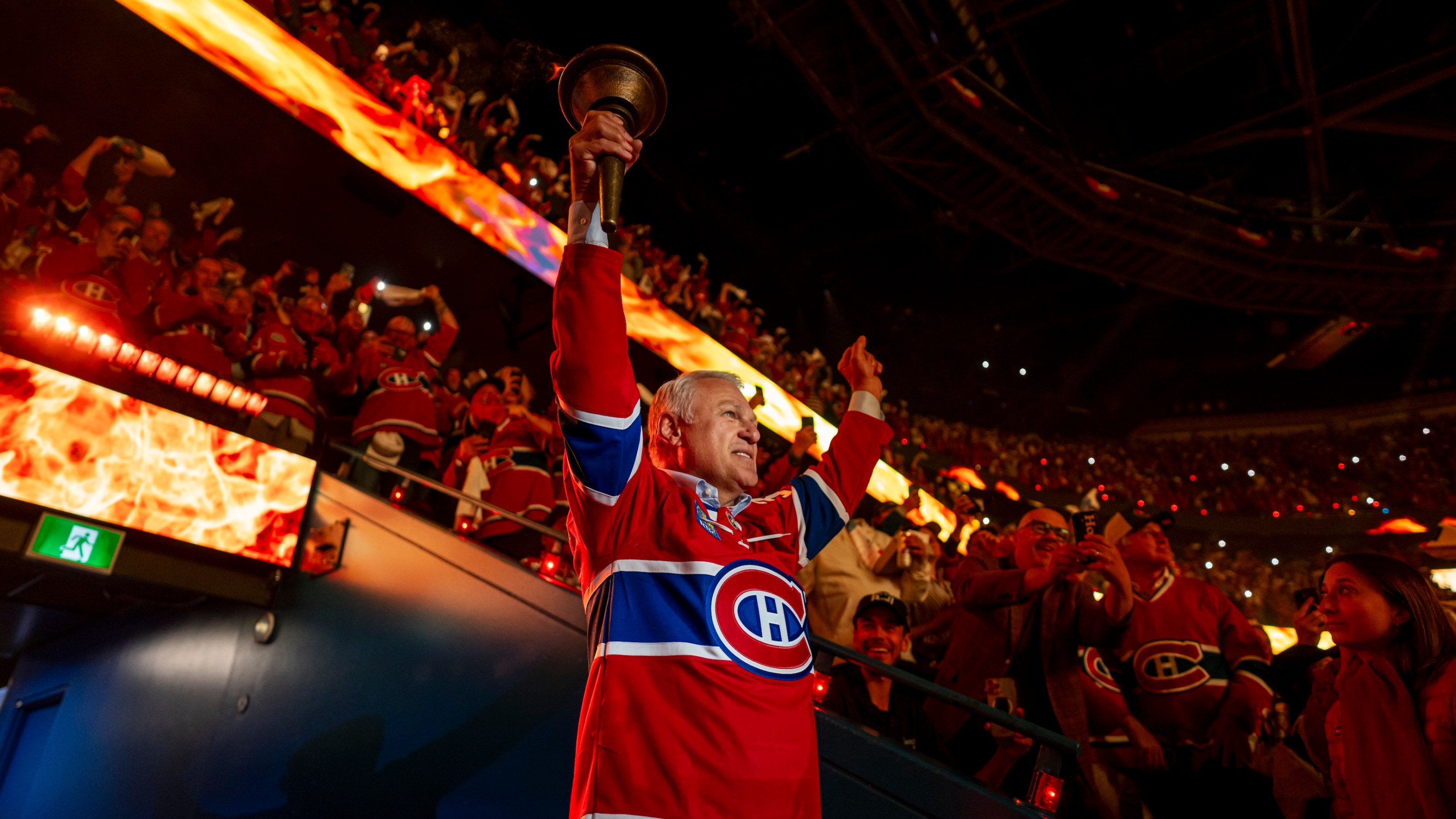 Claude Lemieux carries the torch in the opening ceremony of Game Three of the Eastern Conference Final of the 2026 Stanley Cup Playoffs between the Montreal Canadiens and the Carolina Hurricanes at the Bell Centre on May 25, 2026 in Montreal, Quebec, Canada.