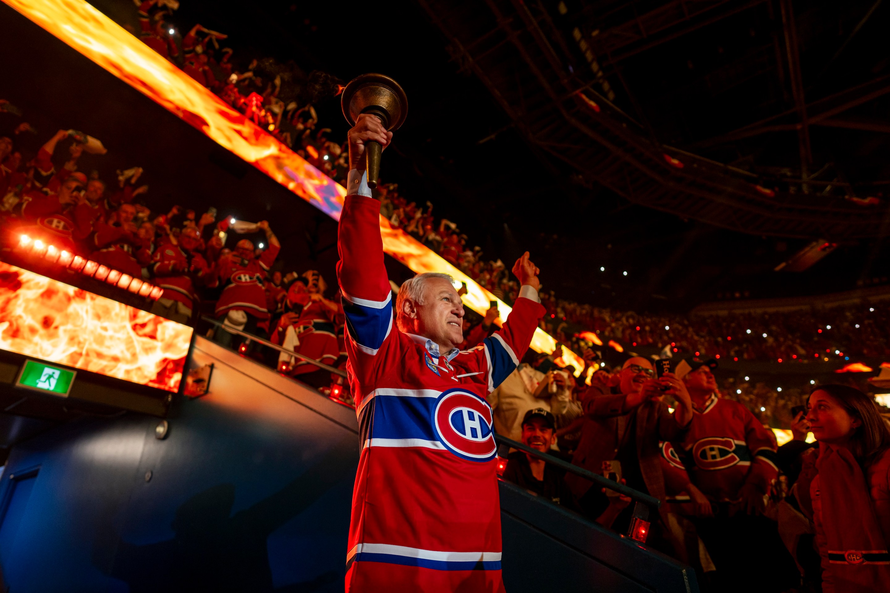 Claude Lemieux carries the torch in the opening ceremony of Game Three of the Eastern Conference Final of the 2026 Stanley Cup Playoffs between the Montreal Canadiens and the Carolina Hurricanes at the Bell Centre on May 25, 2026 in Montreal, Quebec, Canada.