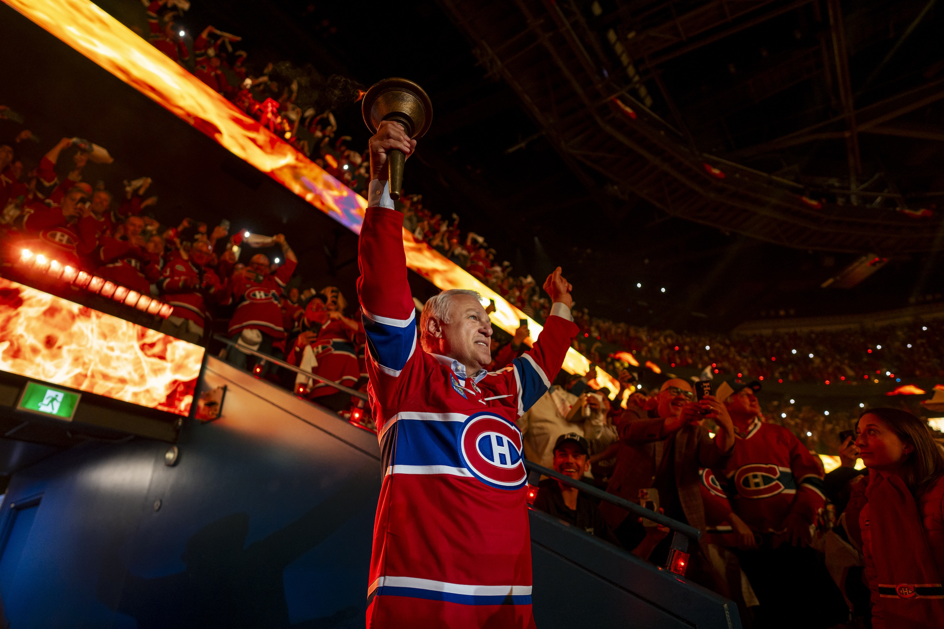 Claude Lemieux carries the torch in the opening ceremony of Game Three of the Eastern Conference Final of the 2026 Stanley Cup Playoffs between the Montreal Canadiens and the Carolina Hurricanes at the Bell Centre on May 25, 2026 in Montreal, Quebec, Canada.