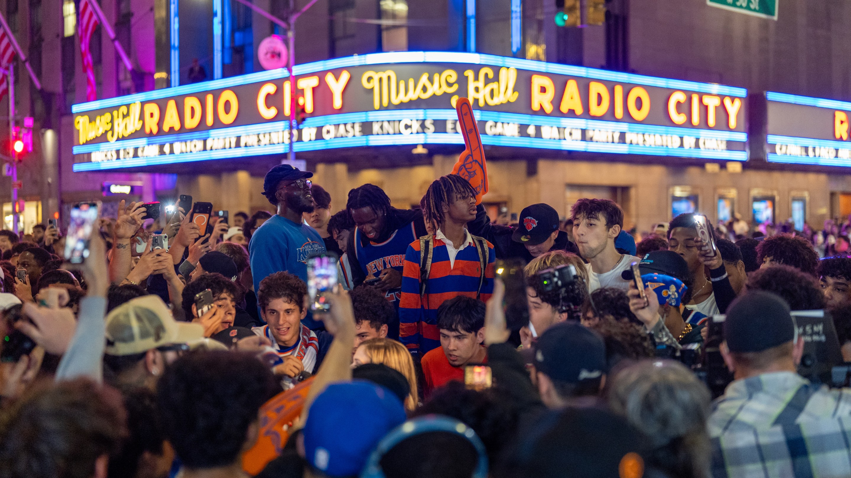 Knicks fans celebrate a trip to the Finals