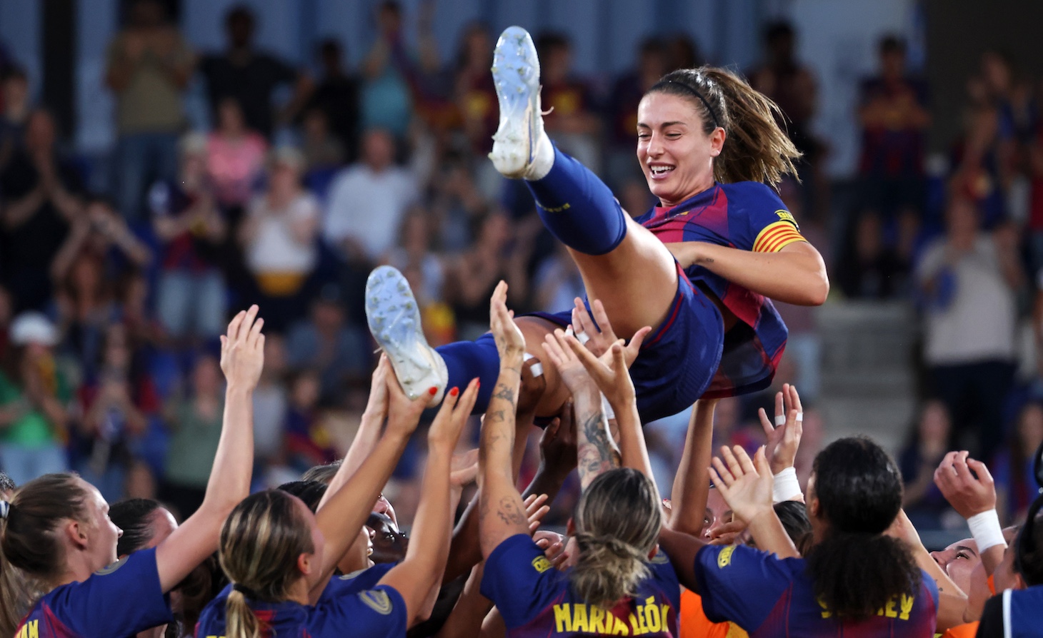 FC Barcelona players toss Alexia Putellas in the air at the end of the match between FC Barcelona Femeni and Real Sociedad Femenino.