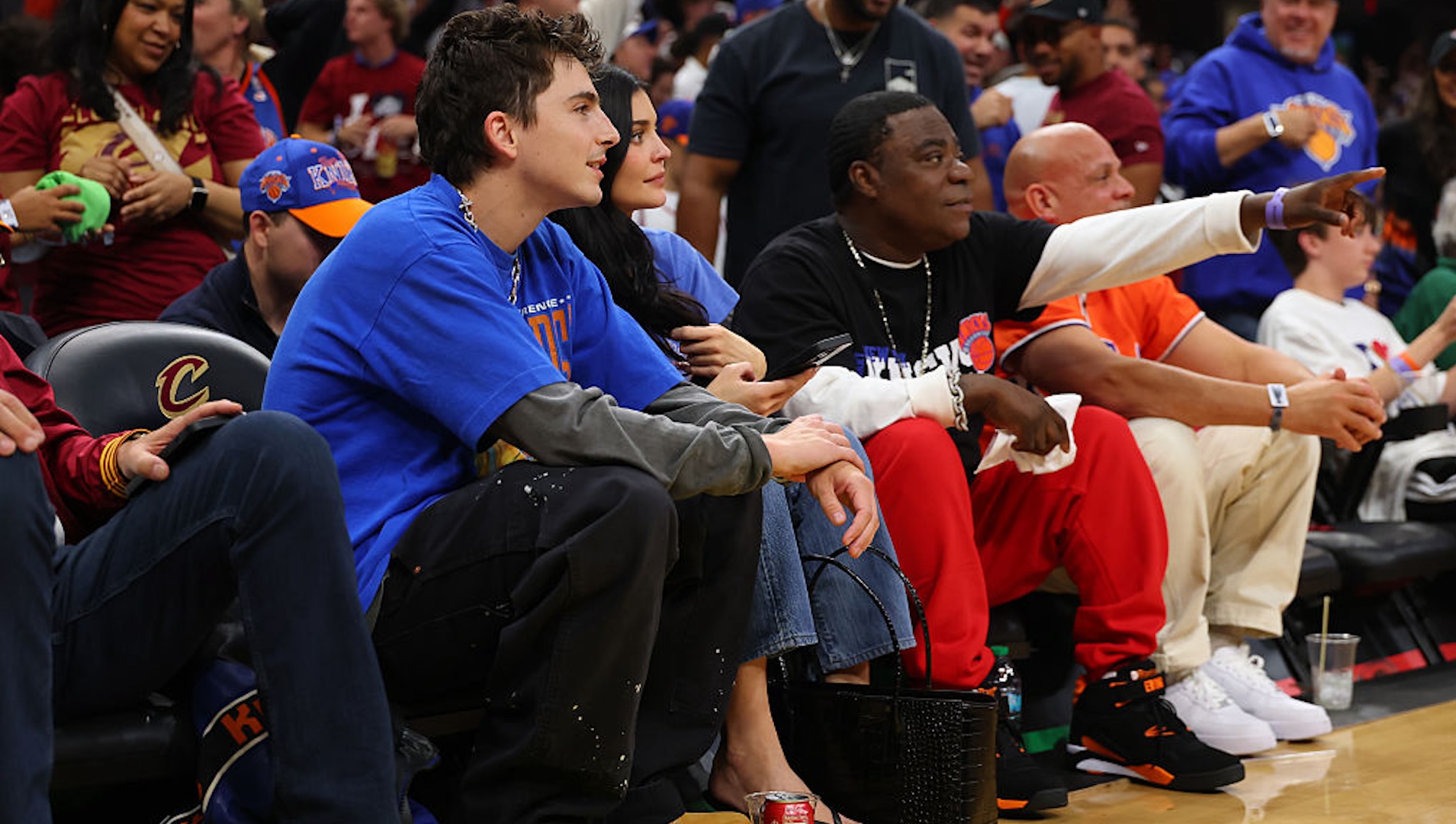 Timothee Chalamet, Kylie Jenner, Tracy Morgan sit courtside.