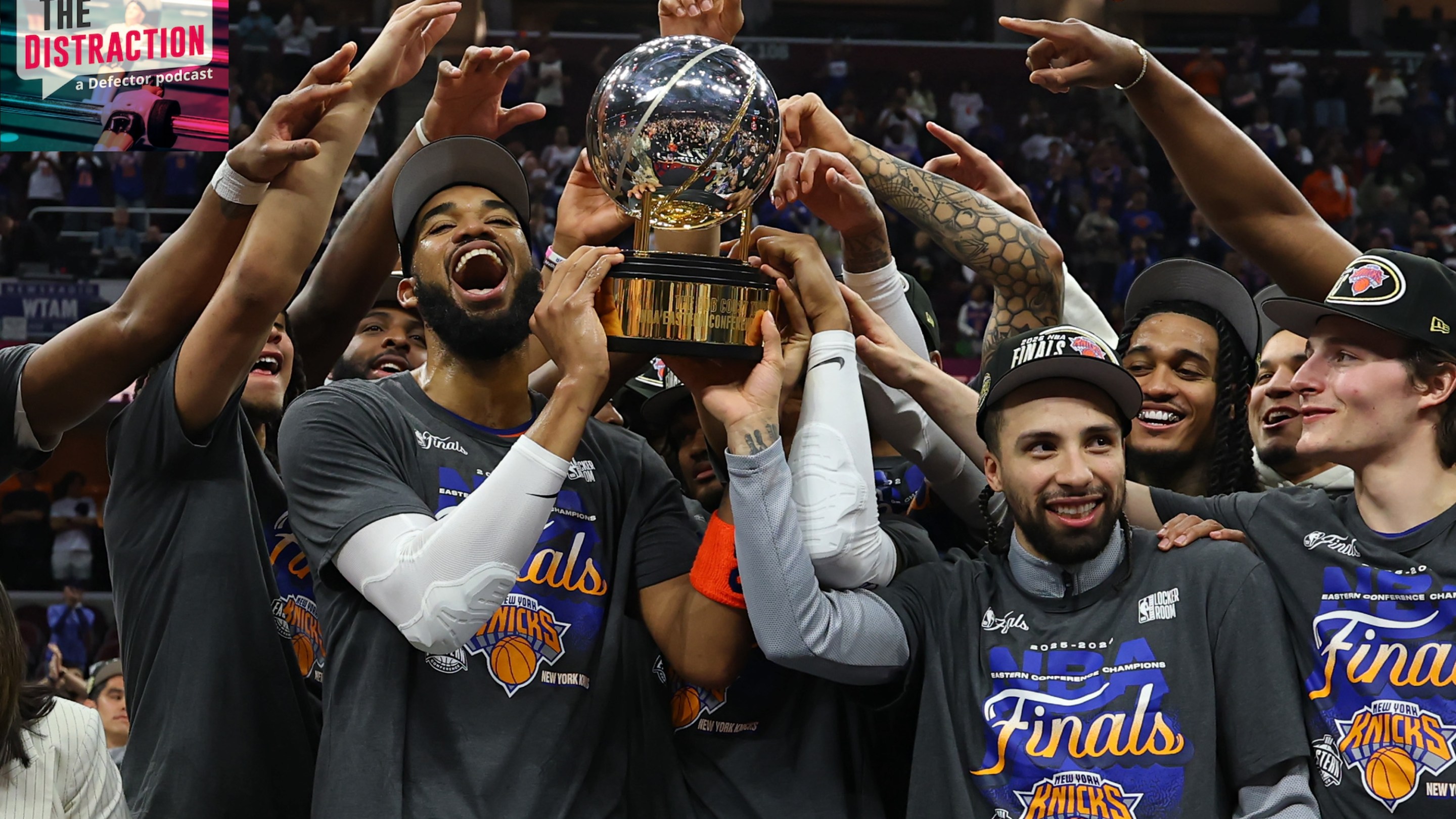 The New York Knicks celebrate with the Bob Cousy Trophy after defeating the Cleveland Cavaliers 130-93 in Game Four of the NBA Eastern Conference Finals at Rocket Arena on May 25, 2026 in Cleveland, Ohio.