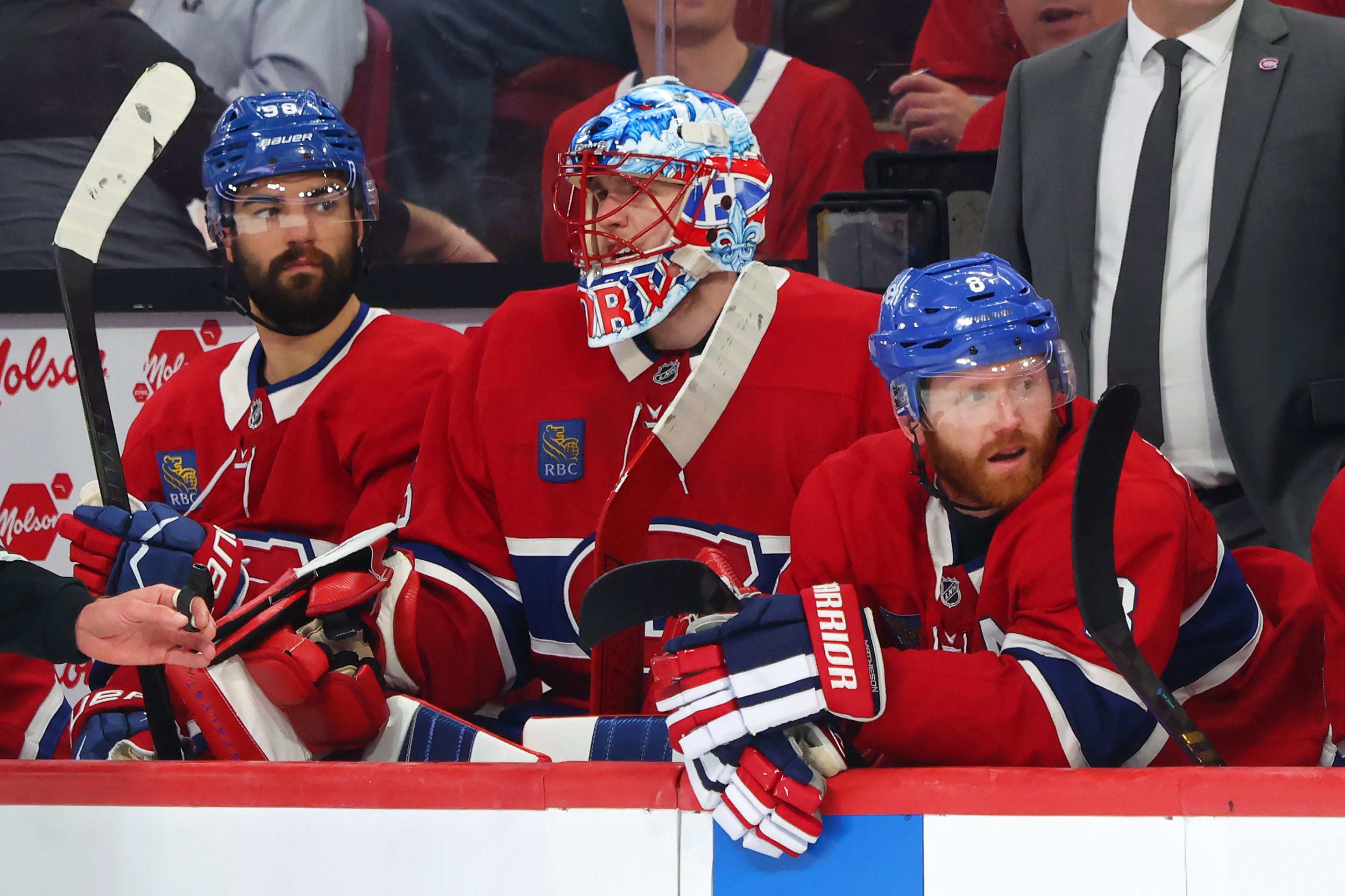 MONTREAL, CANADA - MAY 27: Joe Veleno #90, Jakub Dobes #75, and Mike Matheson #8 of the Montreal Canadiens look on from the bench during the third period in Game Four of the Eastern Conference Final of the 2026 Stanley Cup Playoffs against the Carolina Hurricanes at Bell Centre on May 27, 2026 in Montreal, Quebec, Canada. (Photo by Bruce Bennett/Getty Images)
