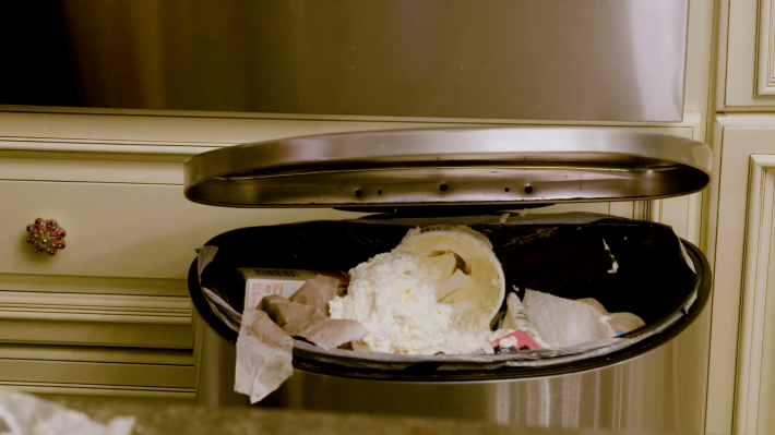 Curdled buttercream in the trash.