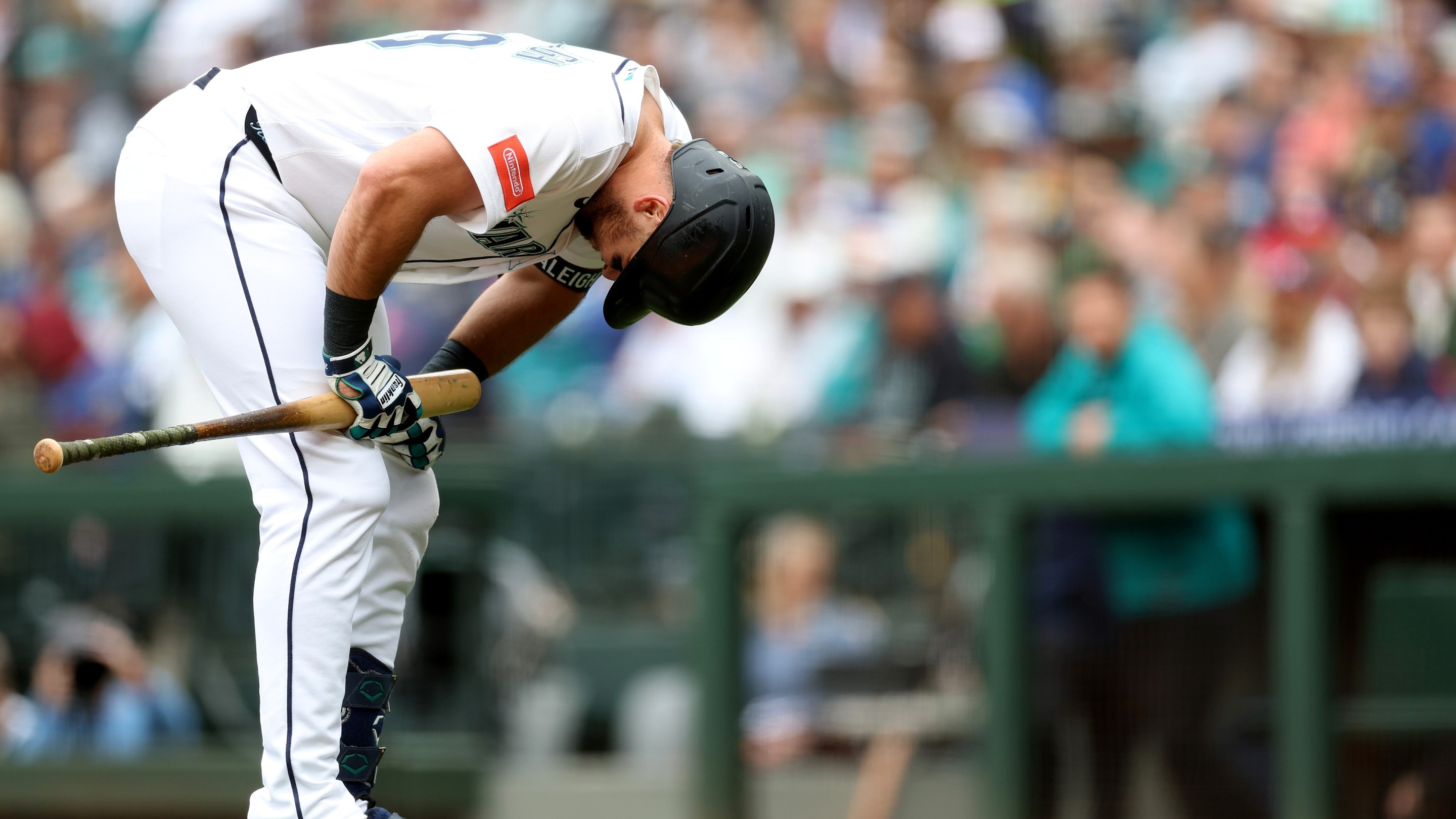 Cal Raleigh #29 of the Seattle Mariners reacts at bat.