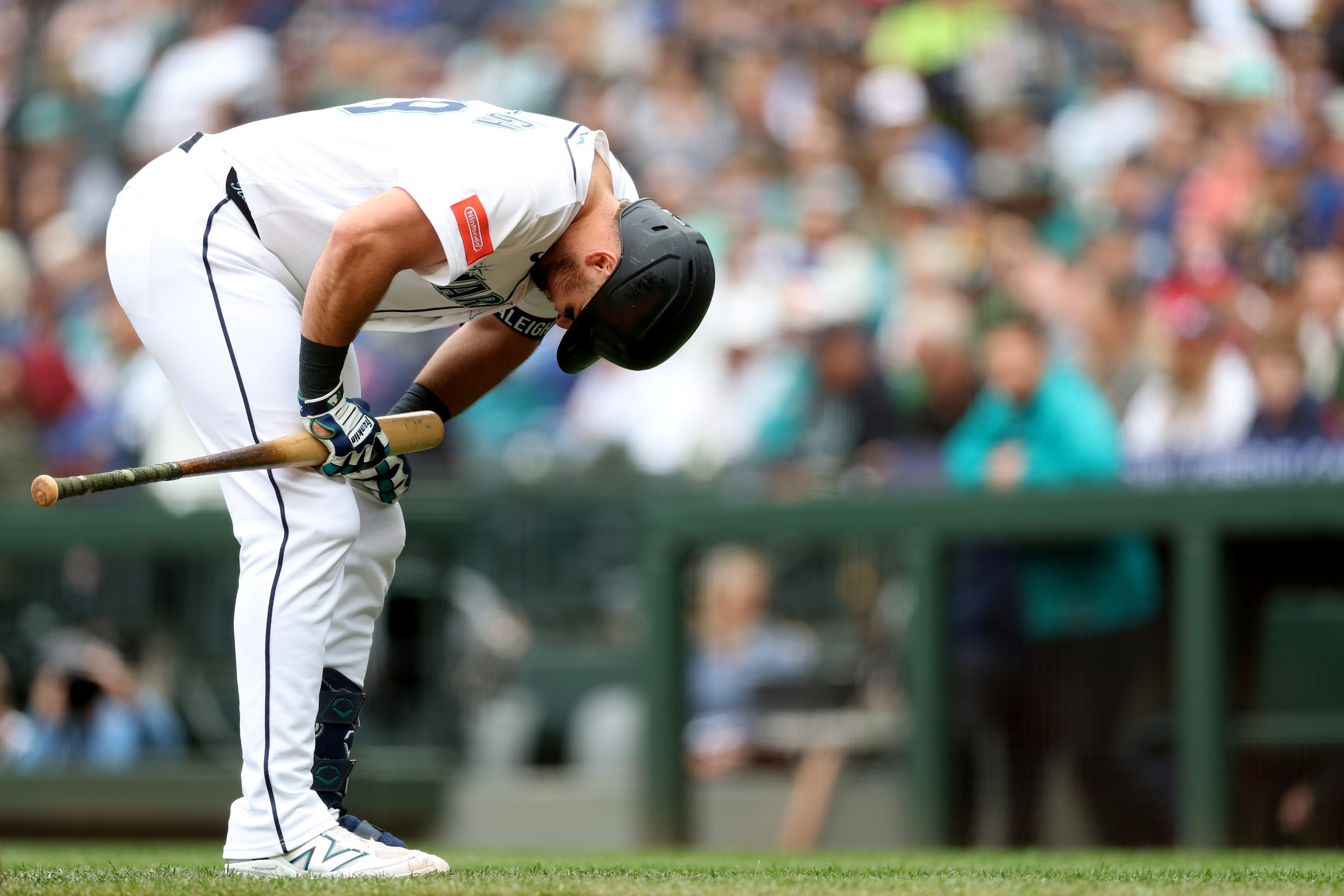 Cal Raleigh #29 of the Seattle Mariners reacts at bat.