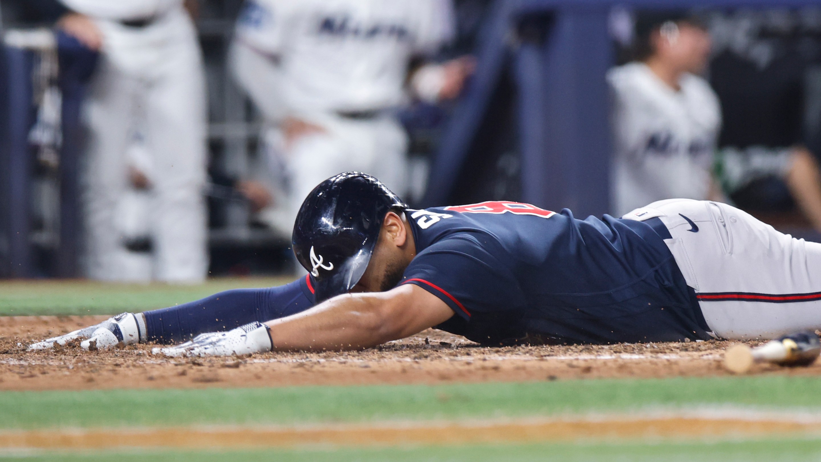 Dominic Smith of the Atlanta Braves scores after a throwing error by Owen Caissie.