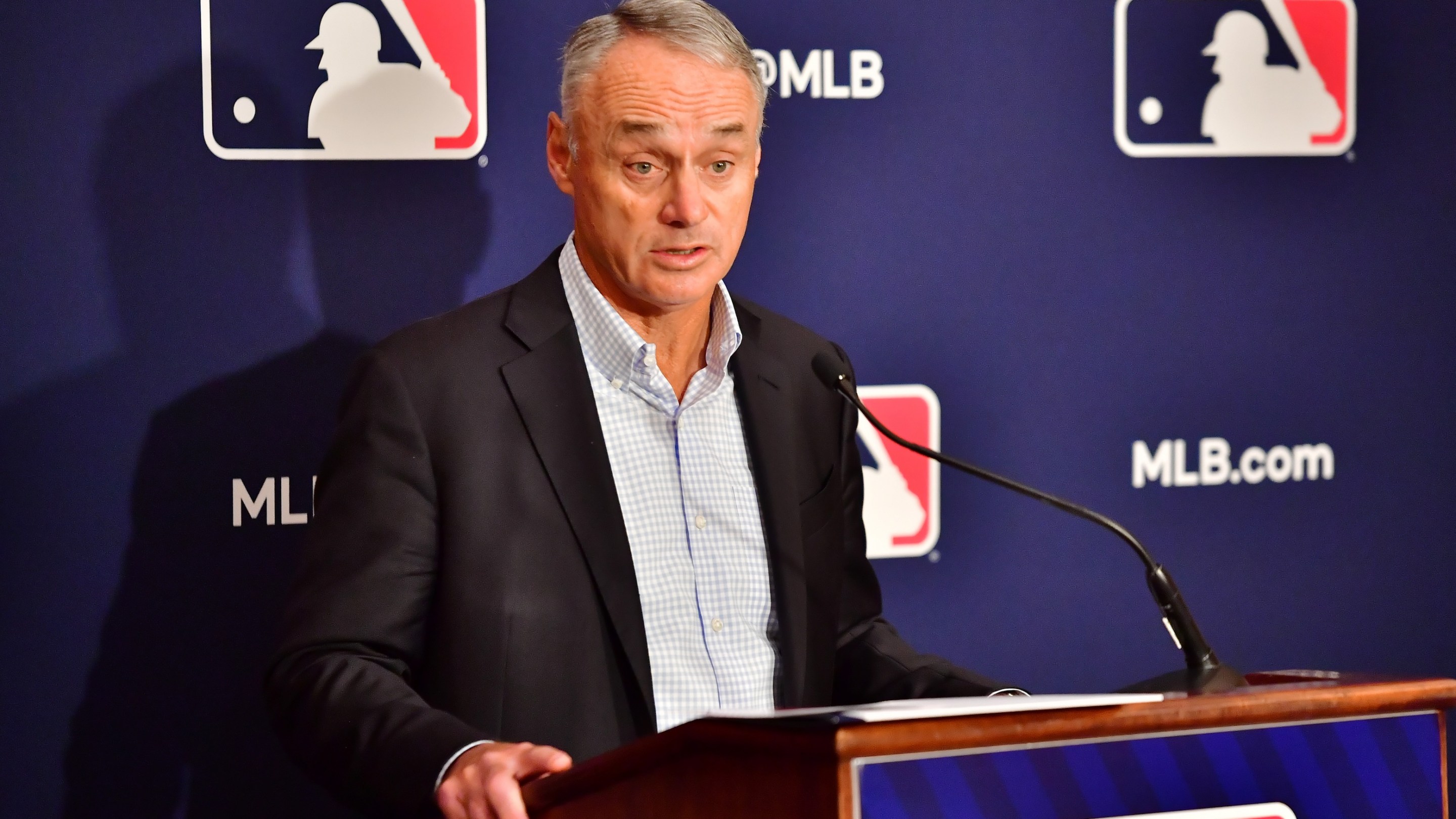 Major League Baseball Commissioner Rob Manfred answers questions during an MLB owner's meeting at the Waldorf Astoria on February 10, 2022 in Orlando, Florida. Manfred addressed the ongoing lockout of players, which owners put in place after the league's collective bargaining agreement ended on December 1, 2021.