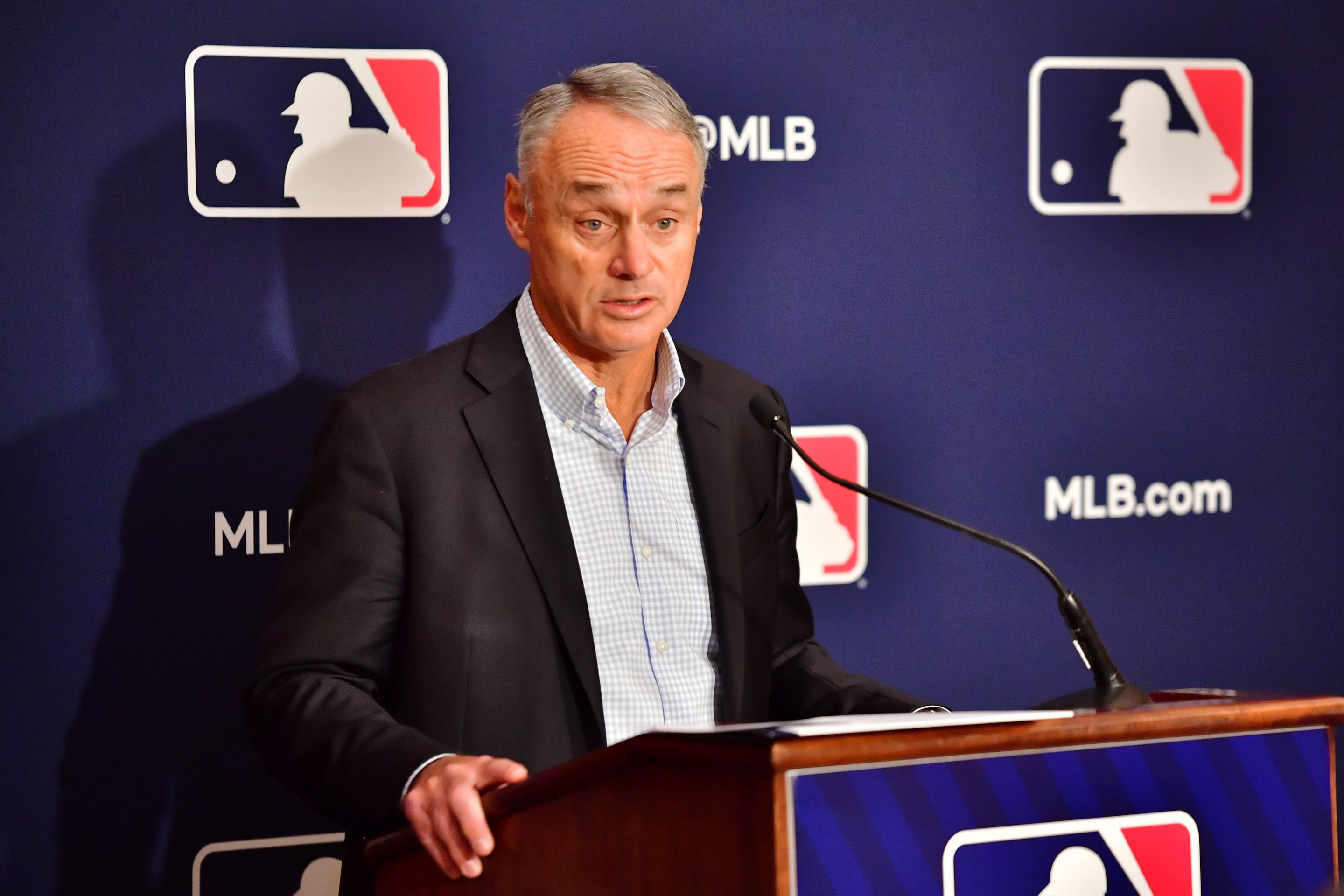 Major League Baseball Commissioner Rob Manfred answers questions during an MLB owner's meeting at the Waldorf Astoria on February 10, 2022 in Orlando, Florida. Manfred addressed the ongoing lockout of players, which owners put in place after the league's collective bargaining agreement ended on December 1, 2021.