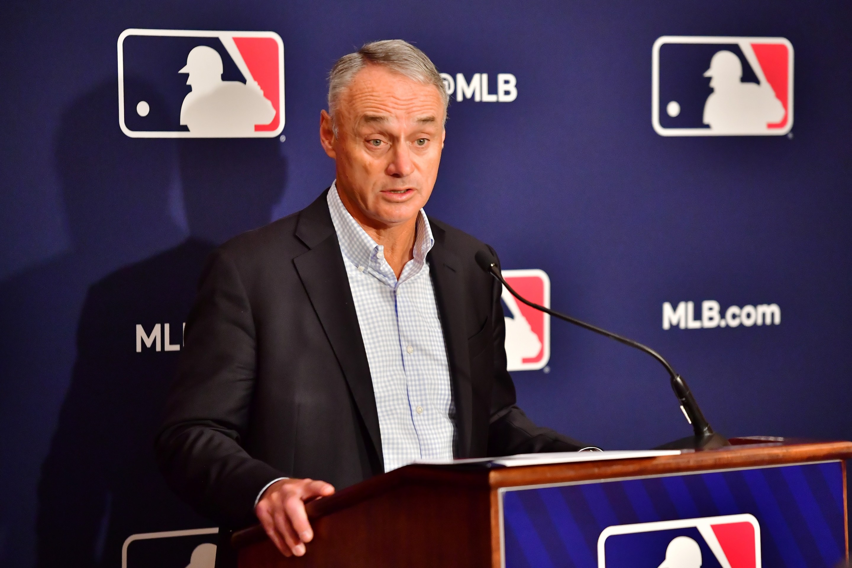 Major League Baseball Commissioner Rob Manfred answers questions during an MLB owner's meeting at the Waldorf Astoria on February 10, 2022 in Orlando, Florida. Manfred addressed the ongoing lockout of players, which owners put in place after the league's collective bargaining agreement ended on December 1, 2021.