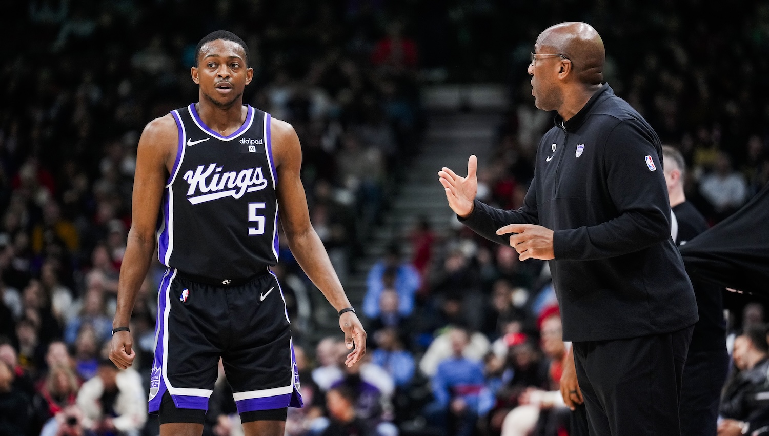 TORONTO, ON - MARCH 20: De'Aaron Fox #5 of the Sacramento Kings speaks to head coach Mike Brown in a break against the Toronto Raptors during the first half of their basketball game at the Scotiabank Arena on March 20, 2024 in Toronto, Ontario, Canada. NOTE TO USER: User expressly acknowledges and agrees that, by downloading and/or using this Photograph, user is consenting to the terms and conditions of the Getty Images License Agreement. (Photo by Mark Blinch/Getty Images)