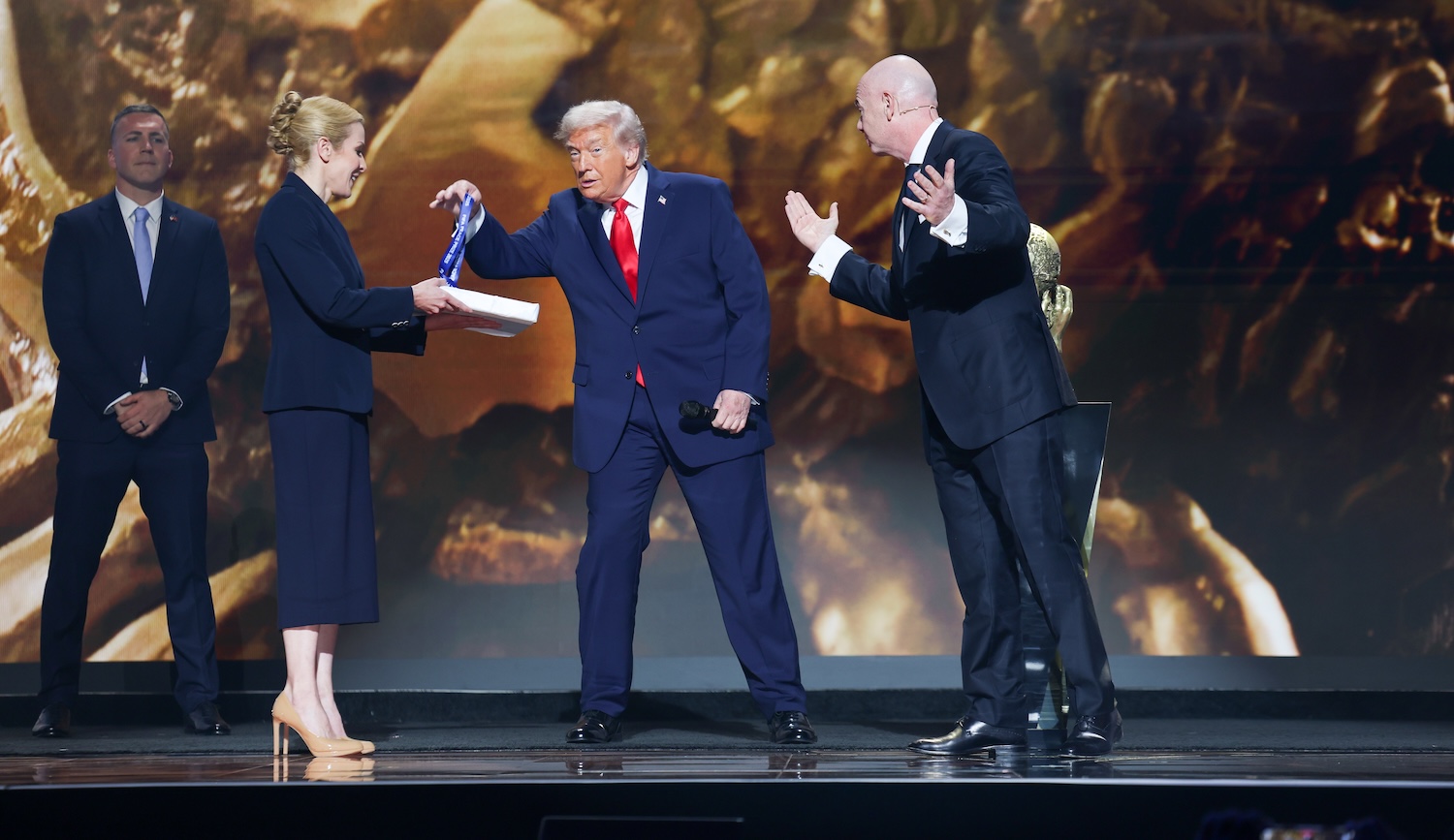 WASHINGTON, DC - DECEMBER 5: FIFA President Gianni Infantino and U.S. President Donald Trump on stage during the FIFA World Cup 2026 official draw at John F. Kennedy Center for the Performing Arts on December 5, 2025 in Washington, DC. (Photo by Tasos Katopodis - FIFA/FIFA via Getty Images)