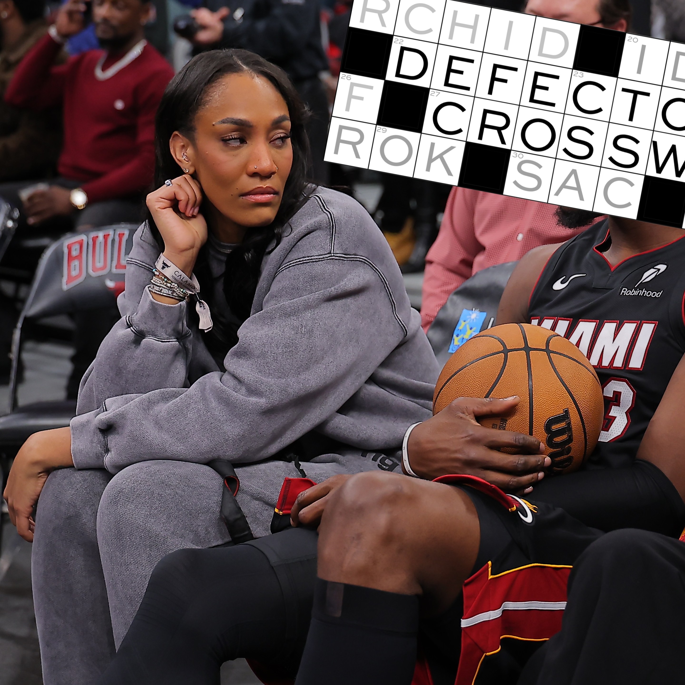 A'ja Wilson and Bam Adebayo #13 of the Miami Heat chat during a delay of a game between the Chicago Bulls and the Miami Heat game on January 8, 2026 at the United Center in Chicago, Illinois