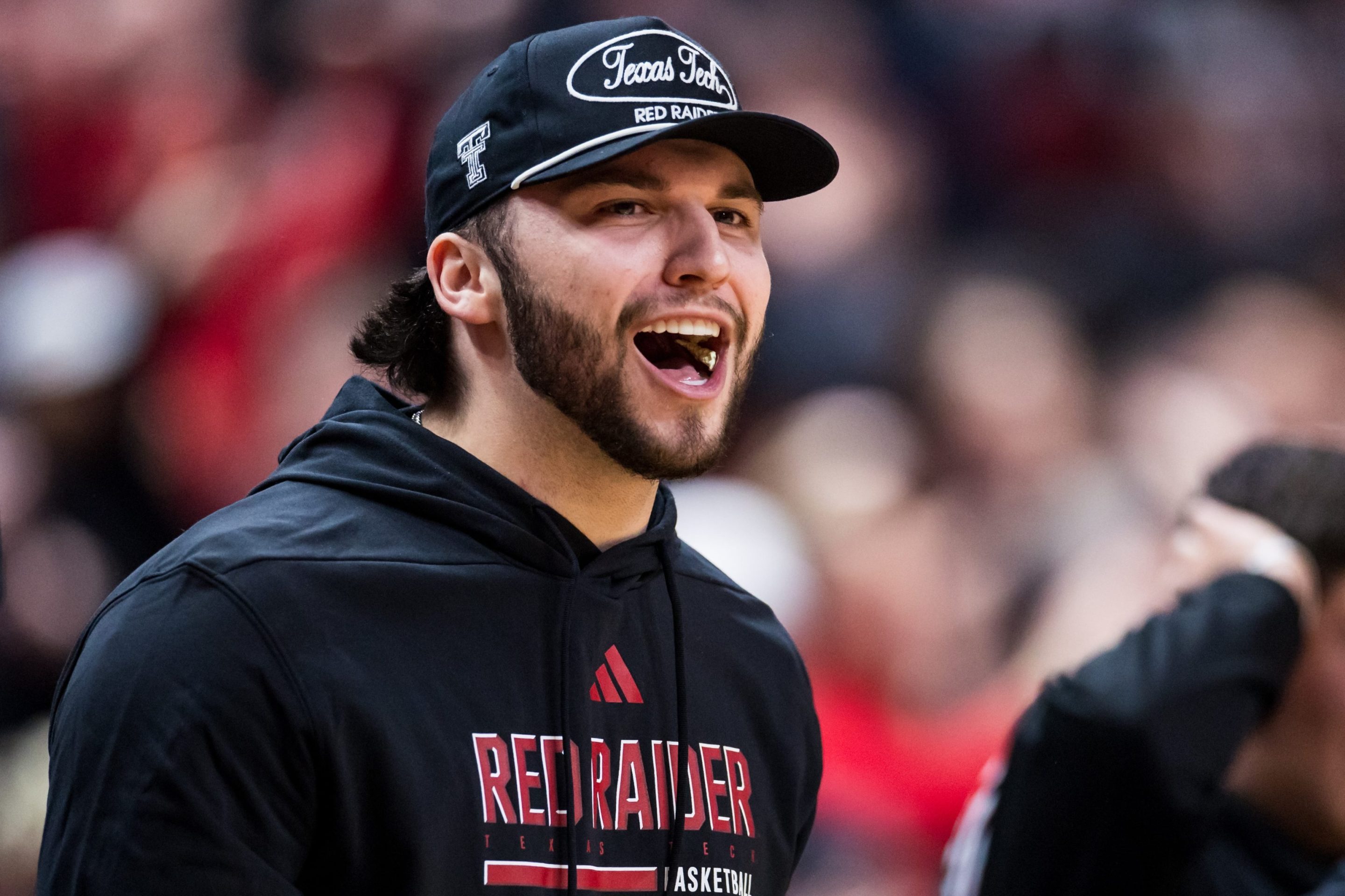 Future Texas Tech quarterback Brendan Sorsby shouts during the first half of the game between the Houston Cougars and the Texas Tech Red Raiders at United Supermarkets Arena on January 24, 2026 in Lubbock, Texas. He looks very happy.