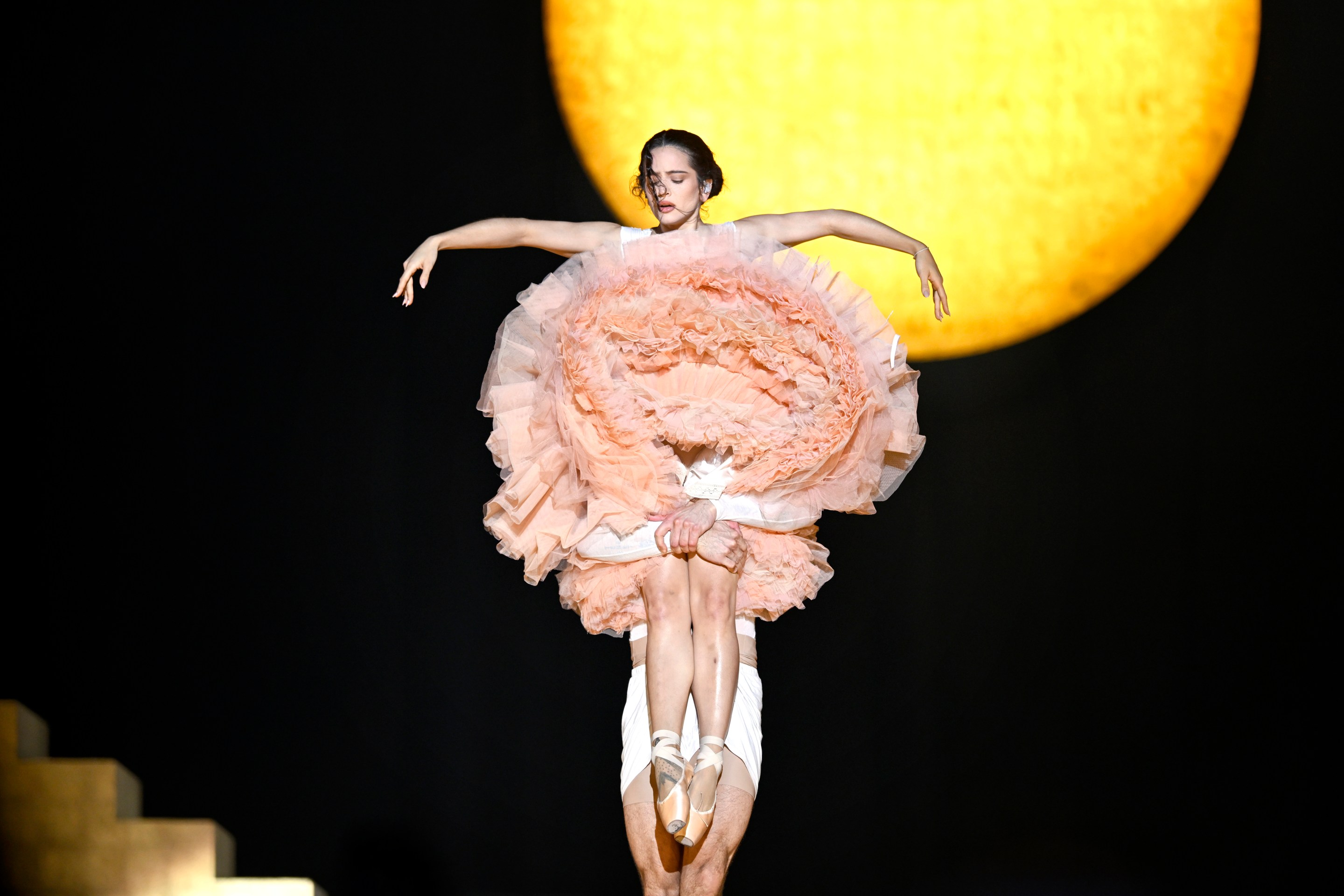 Rosalía performs on stage