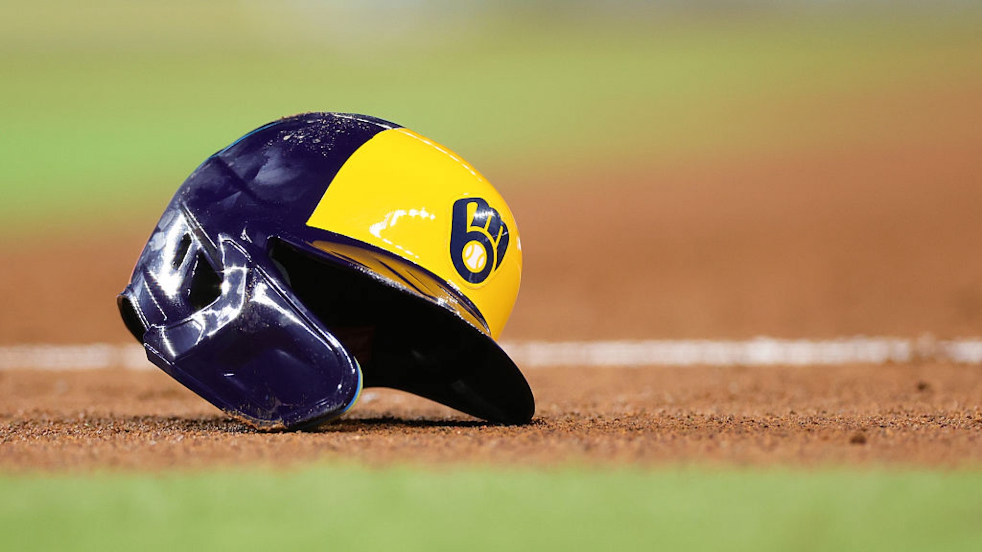 A Brewers helmet on the grass