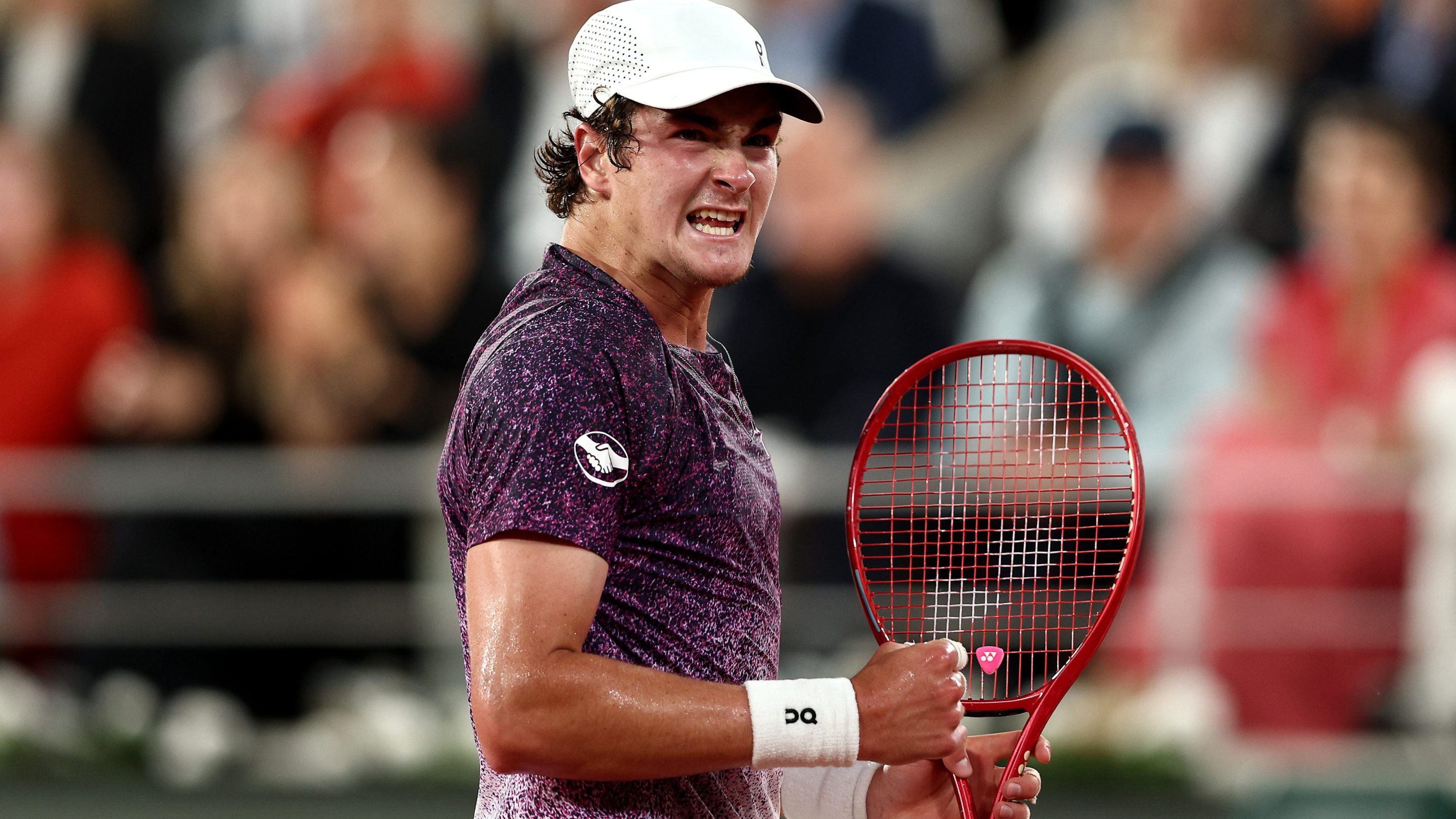 Joao Fonseca of Brazil celebrates a point against Casper Ruud of Norway during the Men's Singles Fourth Round match on Day Eight of the 2026 French Open at Roland Garros on May 31, 2026 in Paris, France. (Photo by James Fearn/Getty Images)