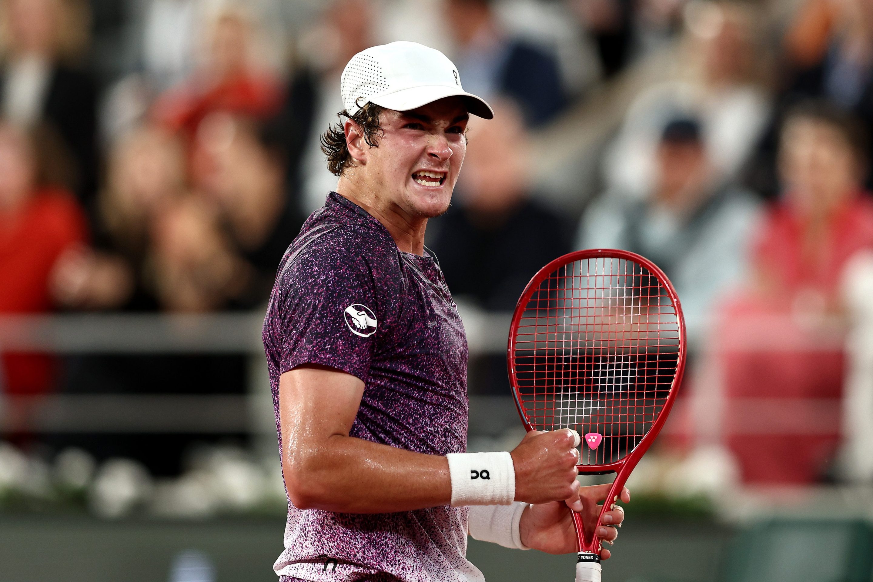 Joao Fonseca of Brazil celebrates a point against Casper Ruud of Norway during the Men's Singles Fourth Round match on Day Eight of the 2026 French Open at Roland Garros on May 31, 2026 in Paris, France. (Photo by James Fearn/Getty Images)