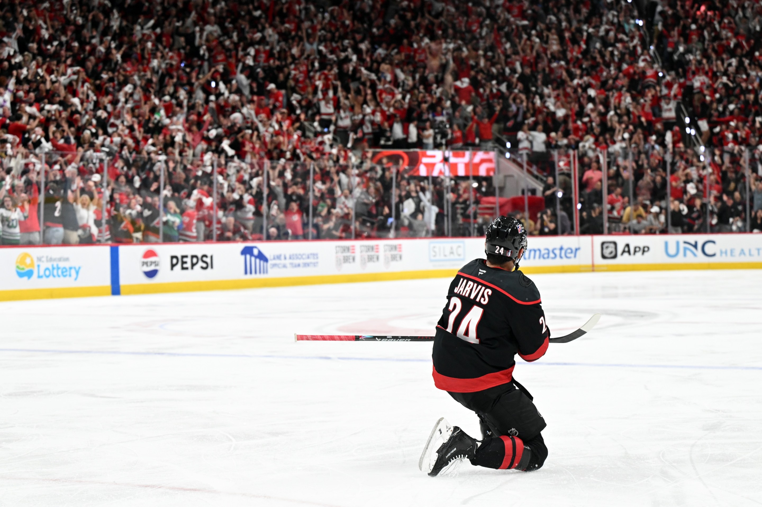 Seth Jarvis (number 24) of the Carolina Hurricanes celebrates toward the home crowd after scoring during game two of the NHL Stanley Cup Final between the Vegas Golden Knights and the Carolina Hurricanes on June 4, 2026.