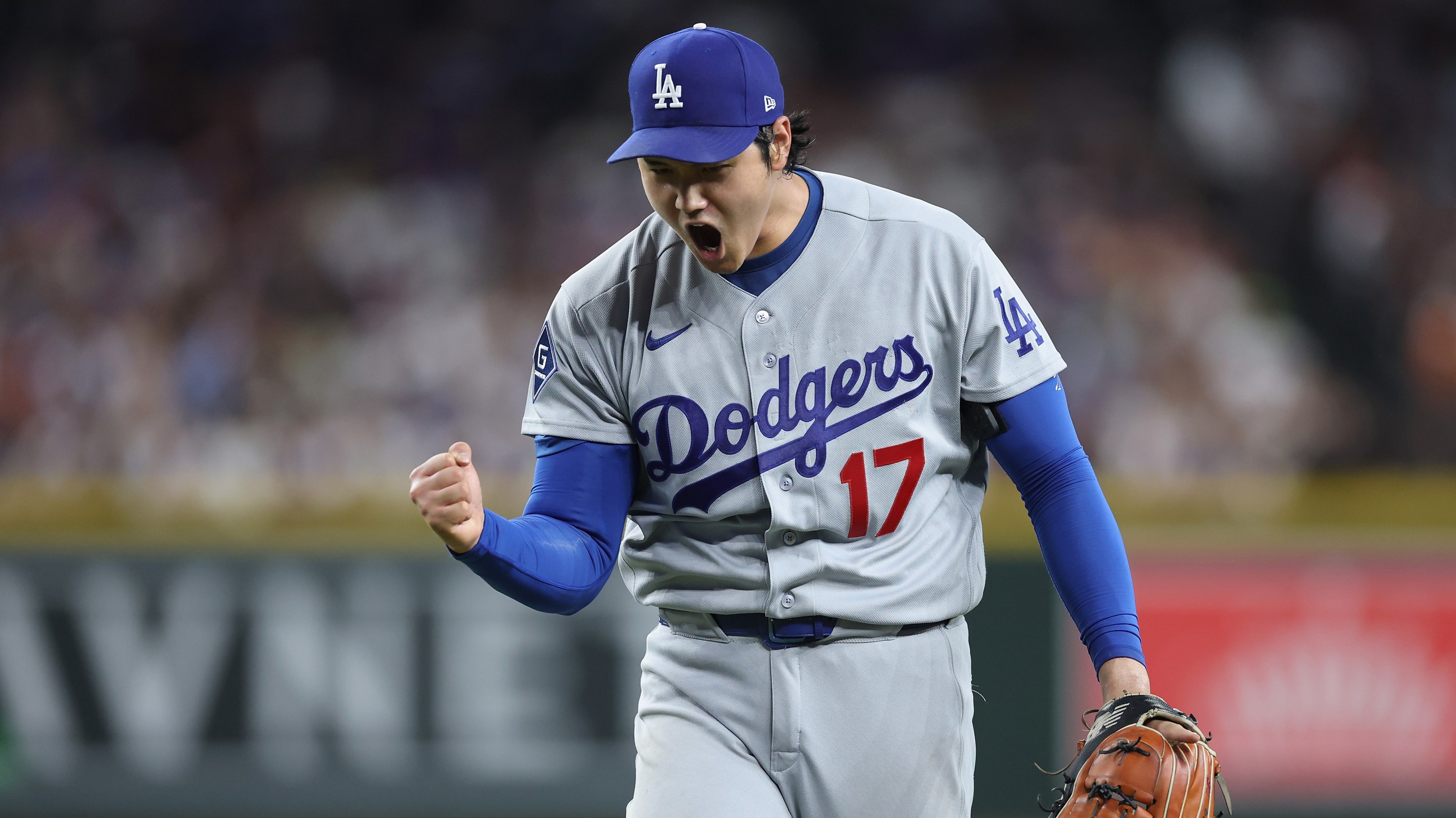 Starting pitcher Shohei Ohtani #17 of the Los Angeles Dodgers reacts after pitching out of the sixth inning