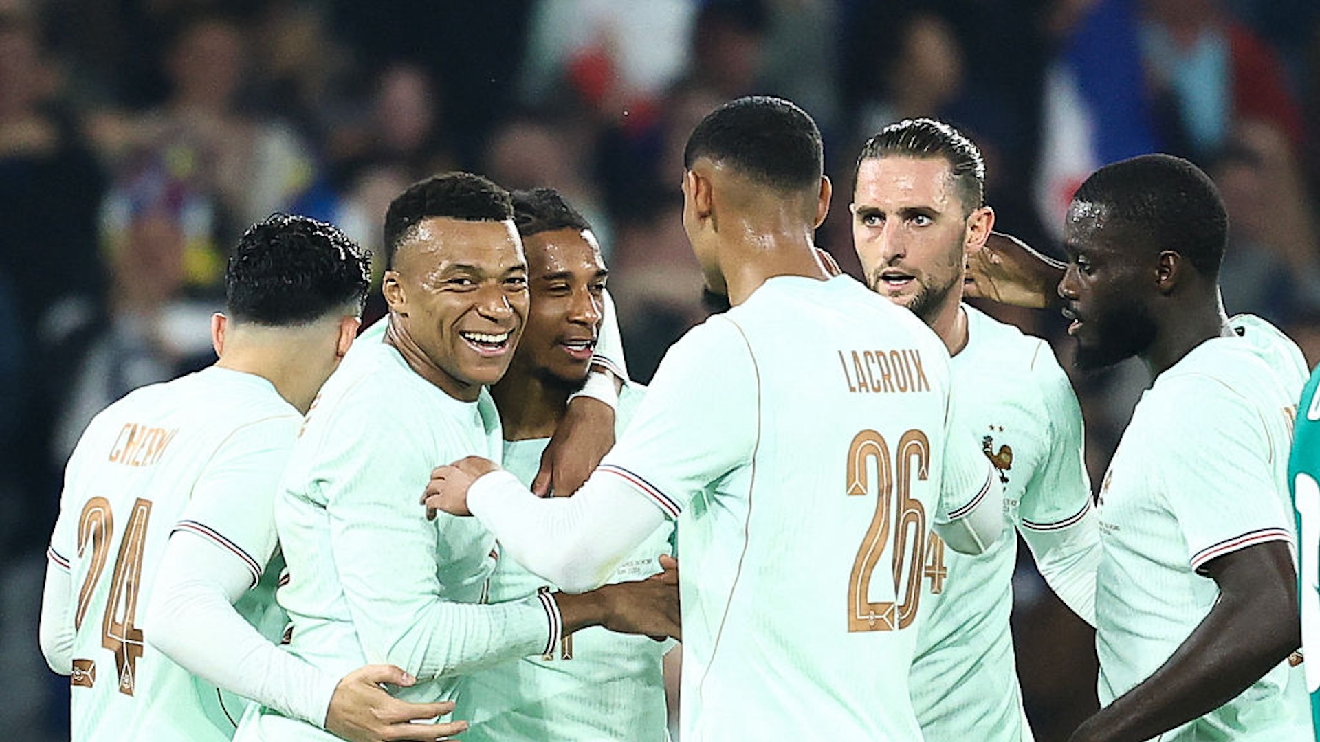 The French national team smiles after scoring a goal