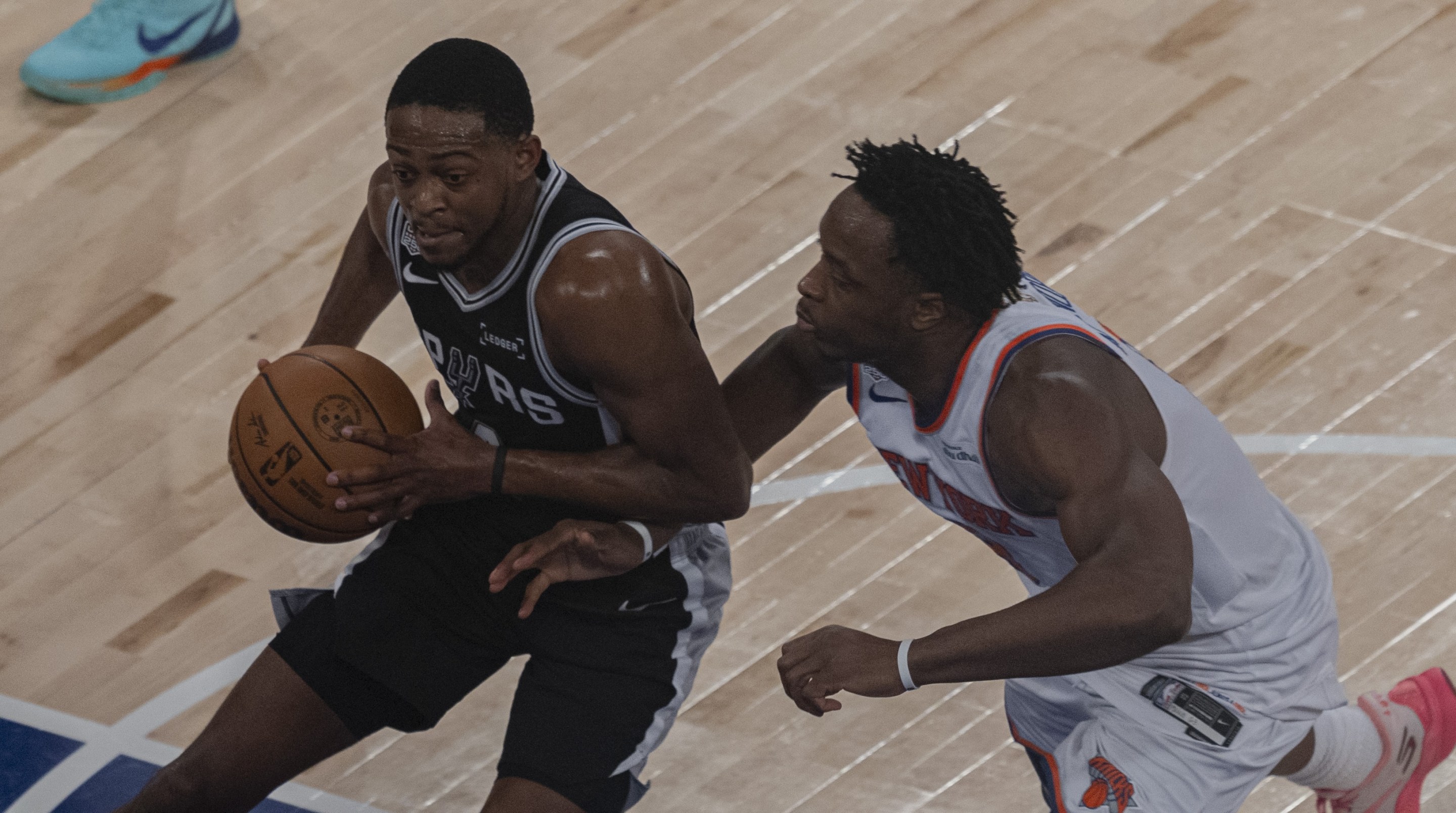 NEW YORK, UNITED STATES - JUNE 8: OG Anunoby (8) of the New York Knicks and De'Aaron Fox (4) of San Antonio Spurs in action during the National Basketball Association (NBA) finals game between the New York Knicks and San Antonio Spurs at the Madison Square Garden in New York, United States on June 8, 2026. (Photo by Celal Gunes/Anadolu via Getty Images)