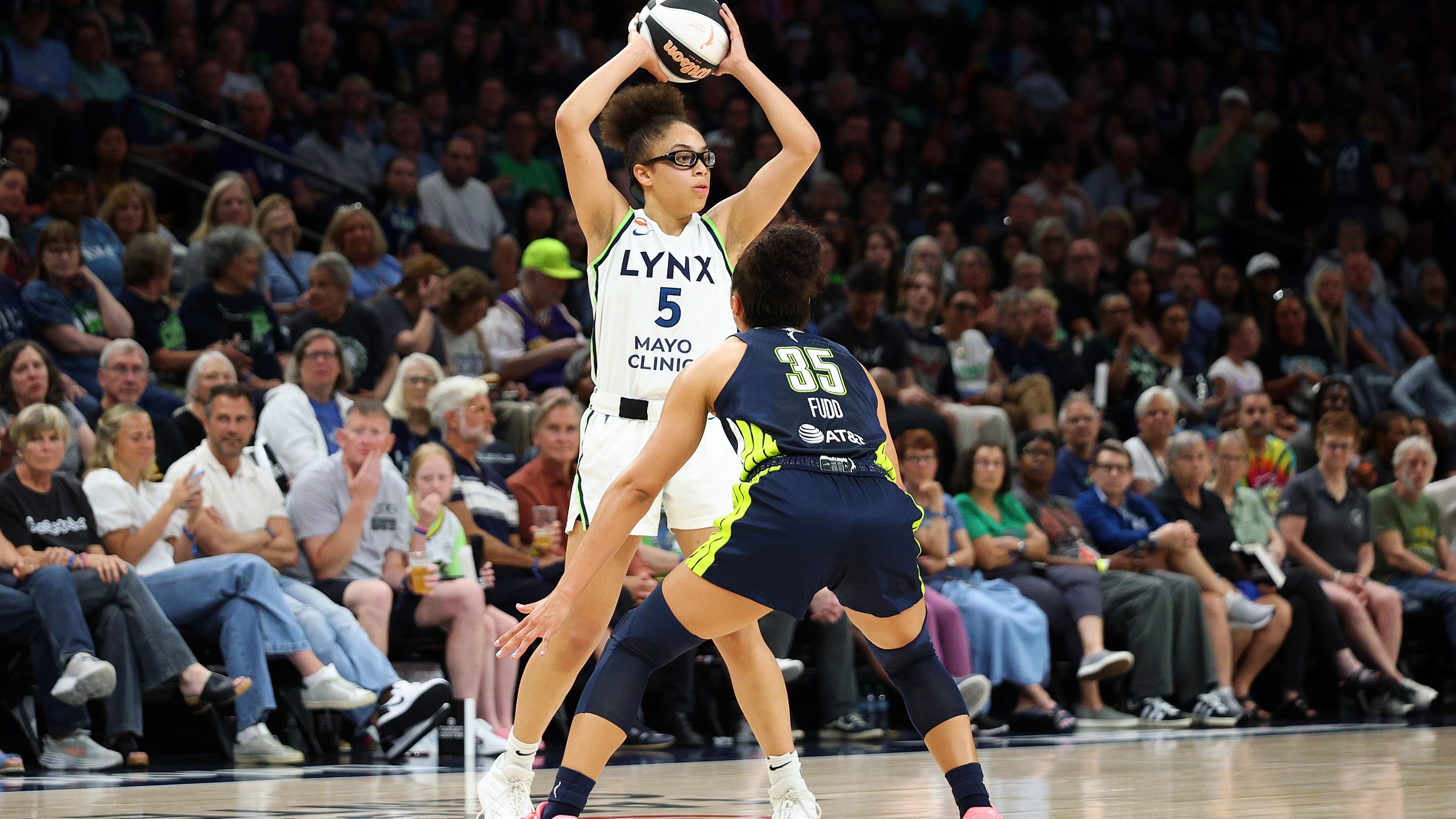 Olivia Miles #5 of the Minnesota Lynx handles the ball against Azzi Fudd #35 of the Dallas Wings in the third quarter at Target Center on June 09, 2026 in Minneapolis, Minnesota. The Lynx defeated the Wings 100-76.