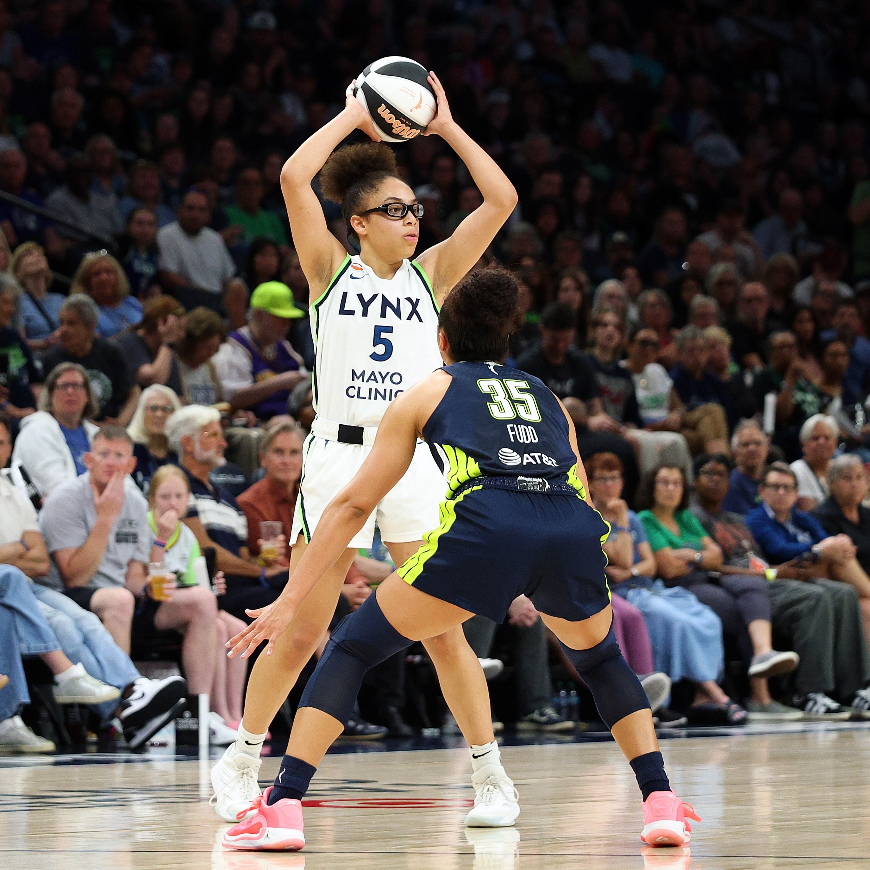 Olivia Miles #5 of the Minnesota Lynx handles the ball against Azzi Fudd #35 of the Dallas Wings in the third quarter at Target Center on June 09, 2026 in Minneapolis, Minnesota. The Lynx defeated the Wings 100-76.