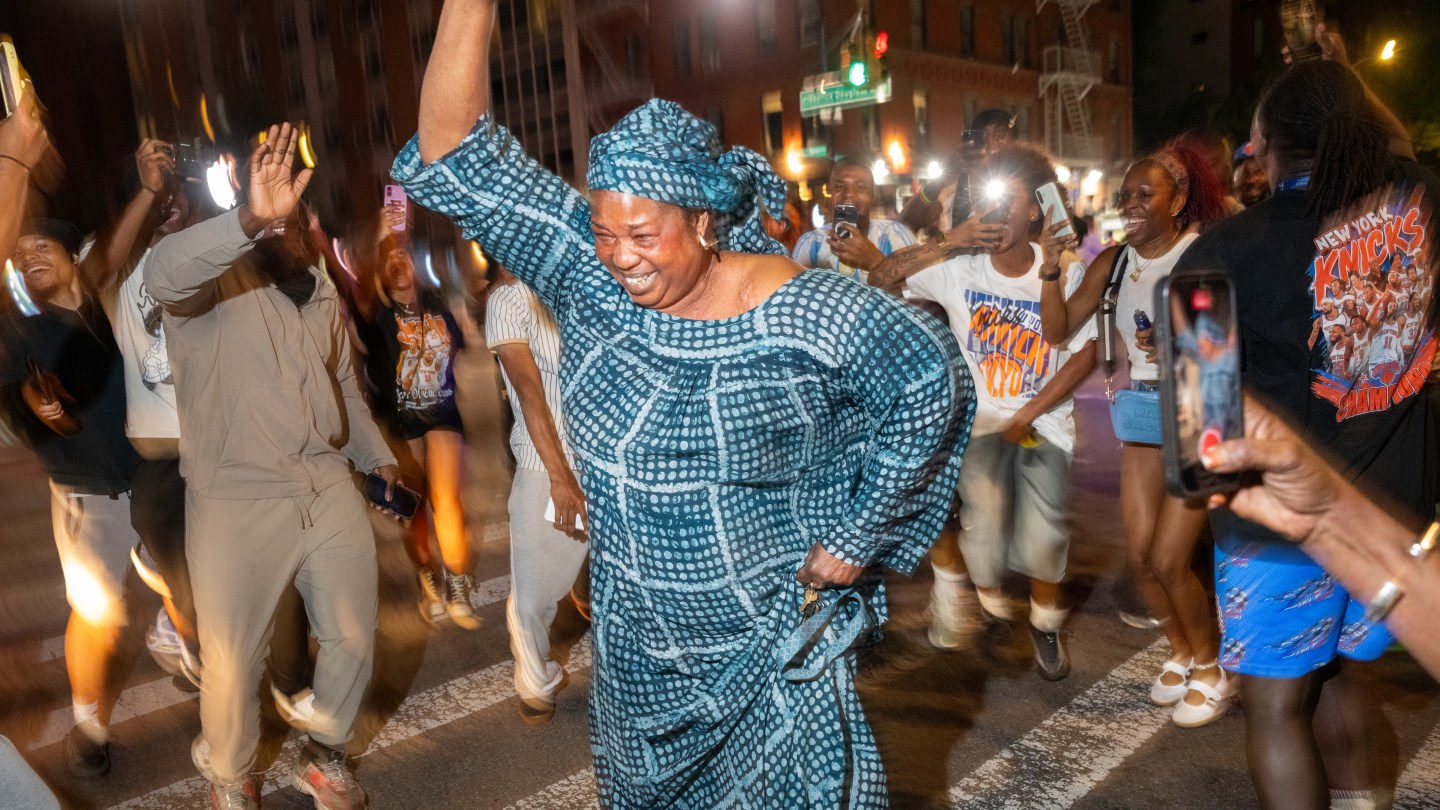 NEW YORK, NEW YORK - JUNE 13: New Yorkers flood the street in Harlem as the Knicks win Game 5 of the NBA finals to win the championship on June 13, 2026 in New York City. The Knicks closed out the San Antonio Spurs to win their first championship since 1973. (Photo by Jeremy Weine/Getty Images)