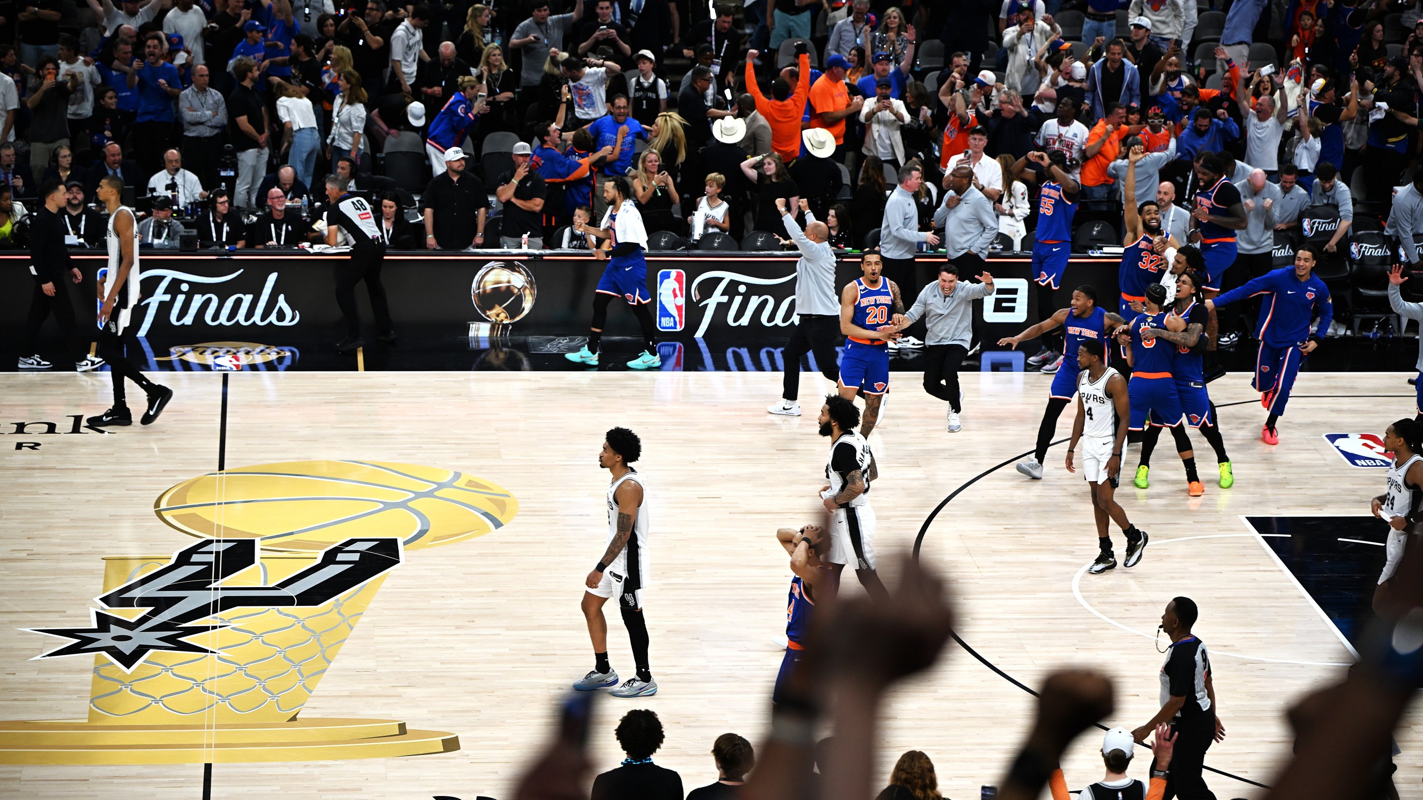 Players of New York Knicks celebrate after the final game 5 between New York Knicks and San Antonio Spurs at the 2025-2026 NBA basketball game in San Antonio, the United States, June 13, 2026. (Photo by Wu Xiaoling/Xinhua via Getty Images)