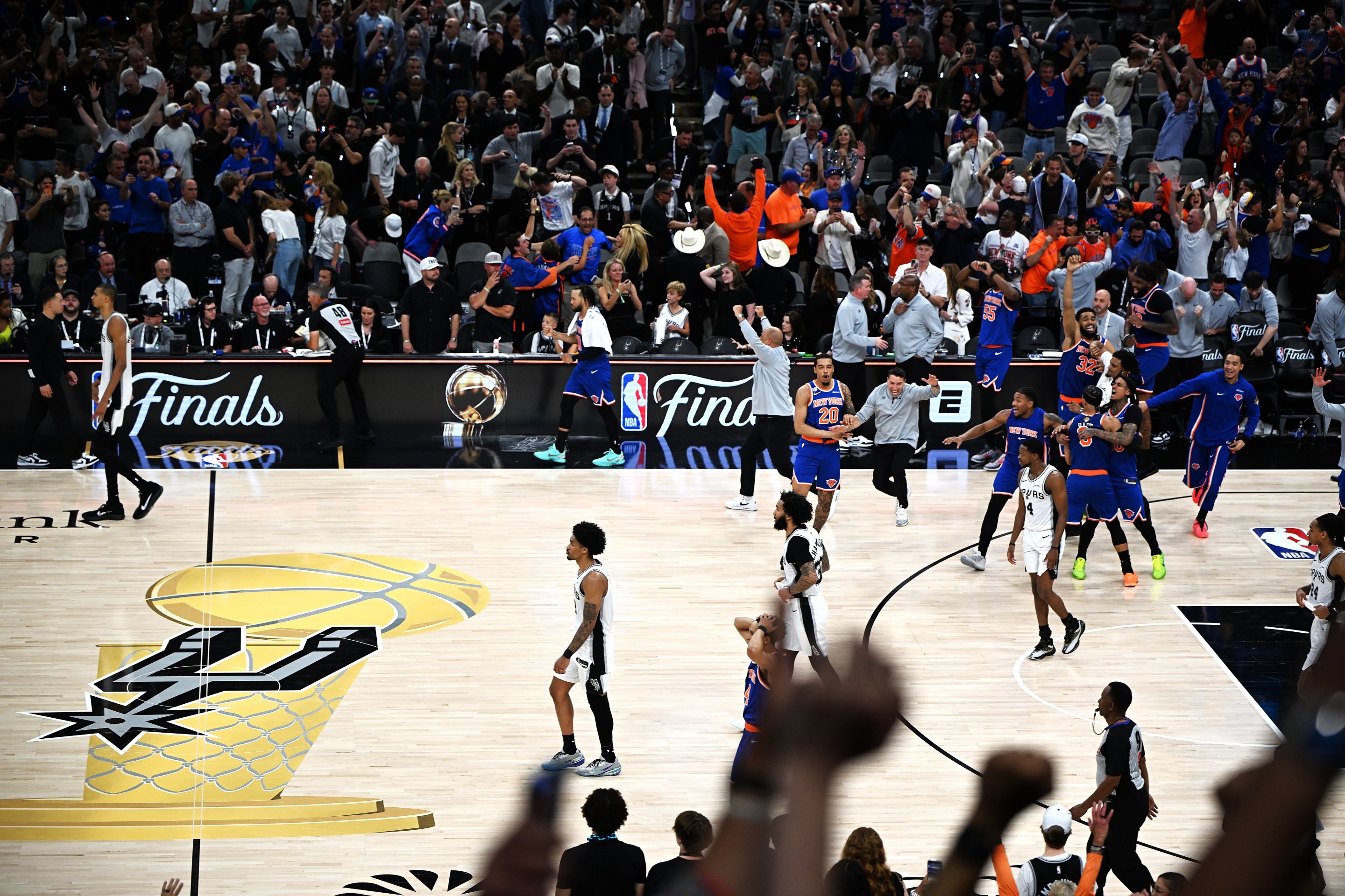 Players of New York Knicks celebrate after the final game 5 between New York Knicks and San Antonio Spurs at the 2025-2026 NBA basketball game in San Antonio, the United States, June 13, 2026. (Photo by Wu Xiaoling/Xinhua via Getty Images)