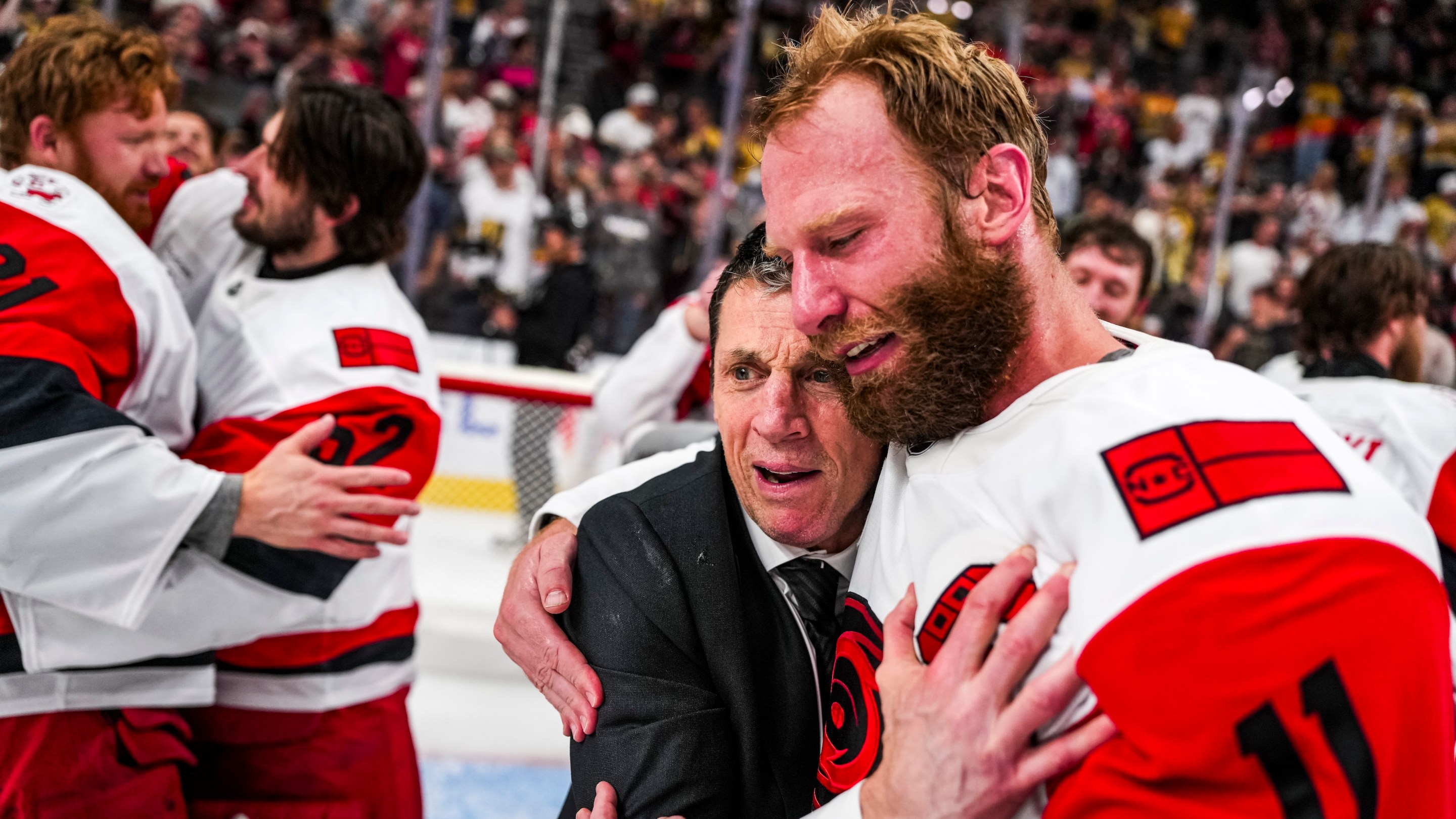 LAS VEGAS, NEVADA - JUNE 14: Carolina Hurricanes Head Coach Rod Brind'Amour celebrates Jordan Staal #11 on the ice after winning the 2026 Stanley Cup Final against the Vegas Golden Knights at T-Mobile Arena on June 14, 2026 in Las Vegas, Nevada. (Photo by Josh Lavallee/NHLI via Getty Images)