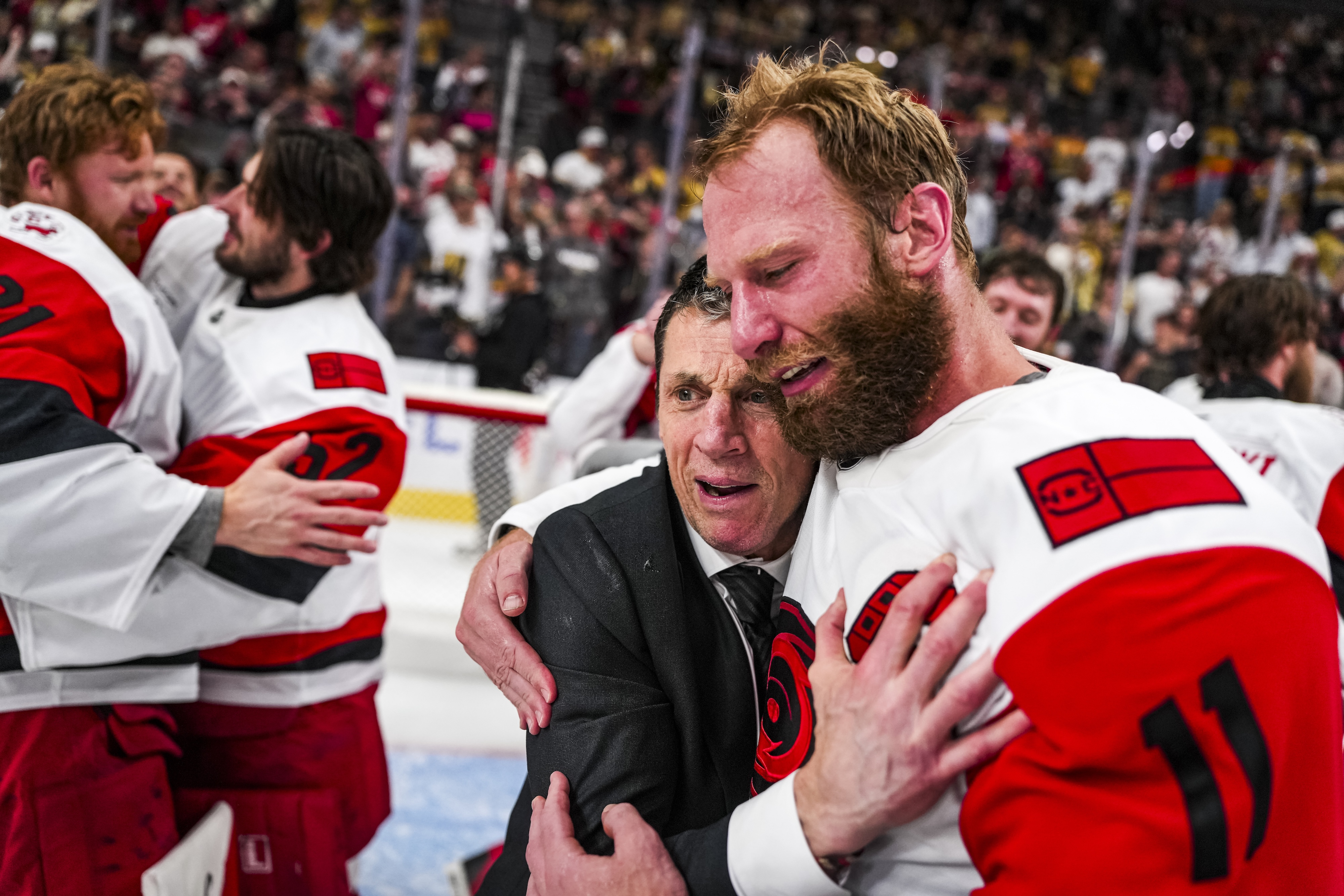 LAS VEGAS, NEVADA - JUNE 14: Carolina Hurricanes Head Coach Rod Brind'Amour celebrates Jordan Staal #11 on the ice after winning the 2026 Stanley Cup Final against the Vegas Golden Knights at T-Mobile Arena on June 14, 2026 in Las Vegas, Nevada. (Photo by Josh Lavallee/NHLI via Getty Images)