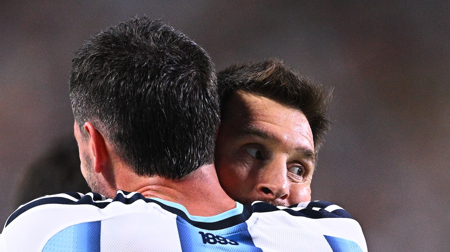 Lionel Messi (right, Argentina) is embraced by Rodrigo De Paul (Argentina) after scoring his second goal to make it 2-0.