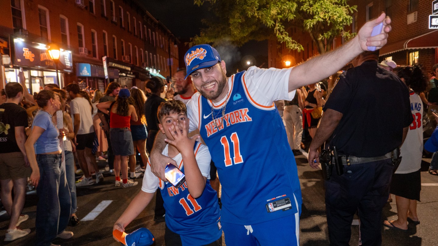 NEW YORK, NEW YORK - JUNE 13: People celebrate after the New York Knicks beat the San Antonio Spurs in game 5 of the NBA finals on June 13, 2026 in New York City. The Knicks won tonight's game in the best of seven series, they are the National Basketball Association championship for the first time in over 50 years. (Photo by Spencer Platt/Getty Images)